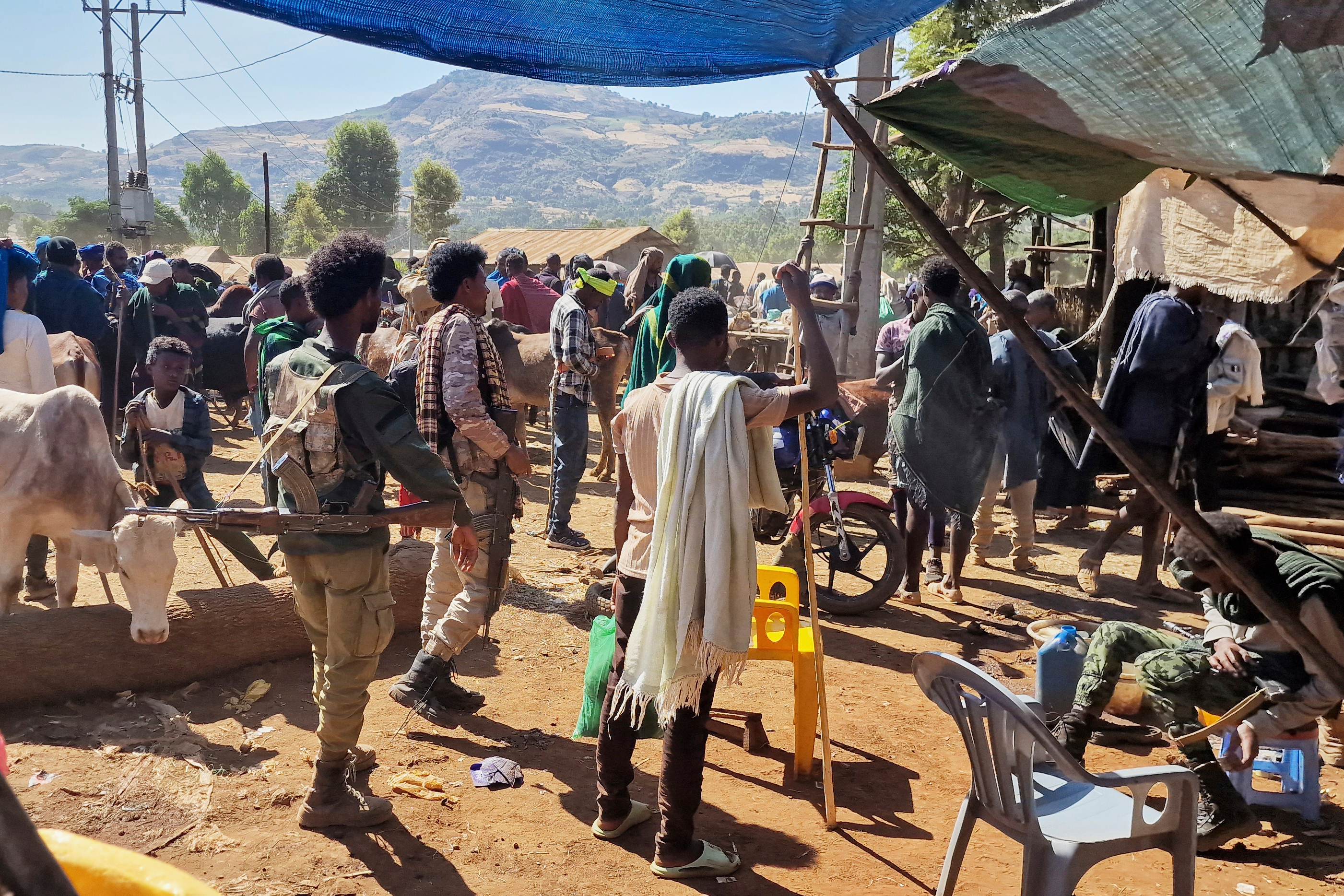 Fano militia members patrol the Sangi livestock market in Ethiopia’s Amhara region on January 23, 2025 [AP]