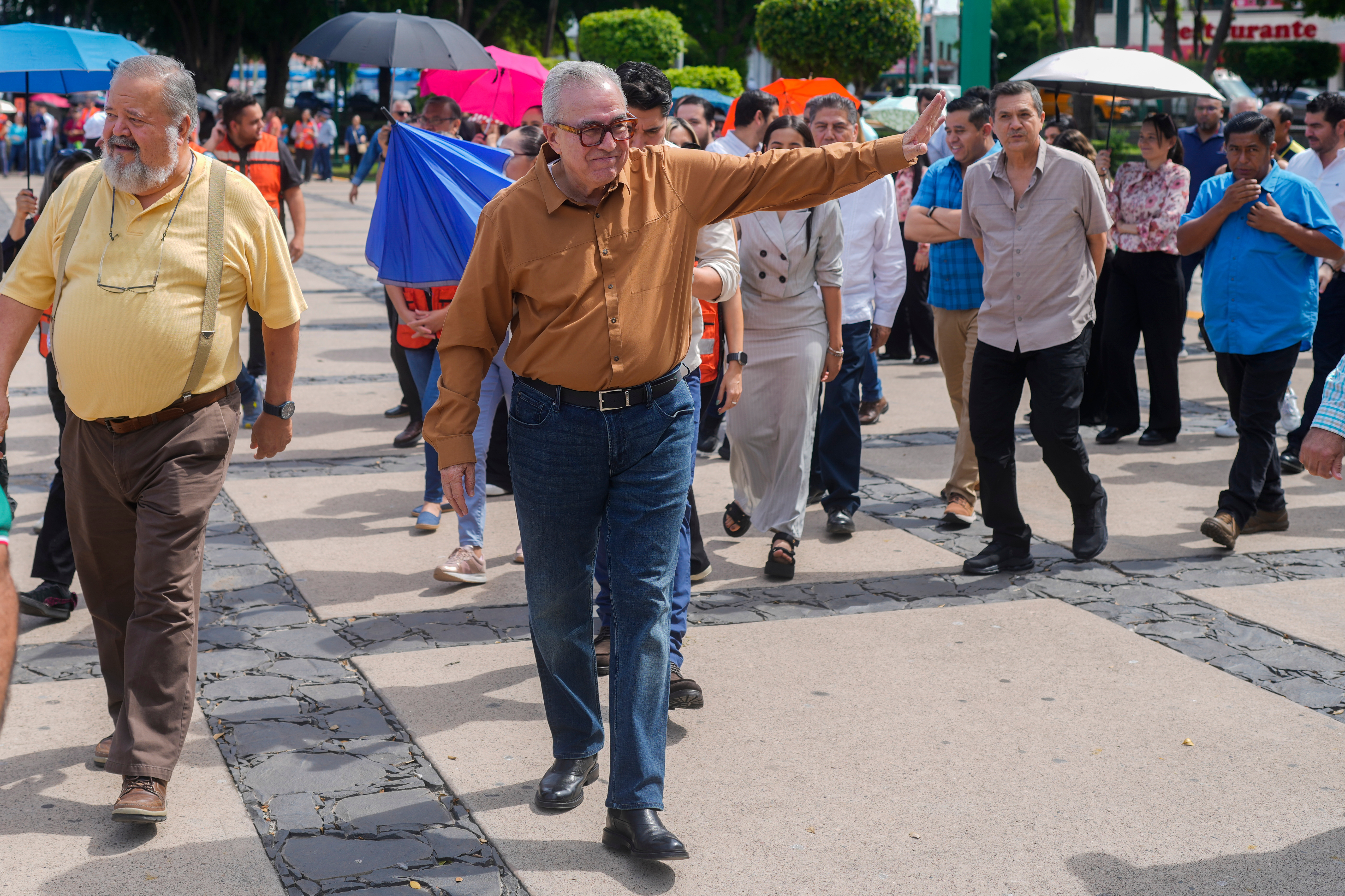 FILE - Sinaloa state Gov. Ruben Rocha waves as he takes part in an annual earthquake drill in Culiacan, Mexico, Sept. 19, 2024. (AP Photo/Eduardo Verdugo, File)