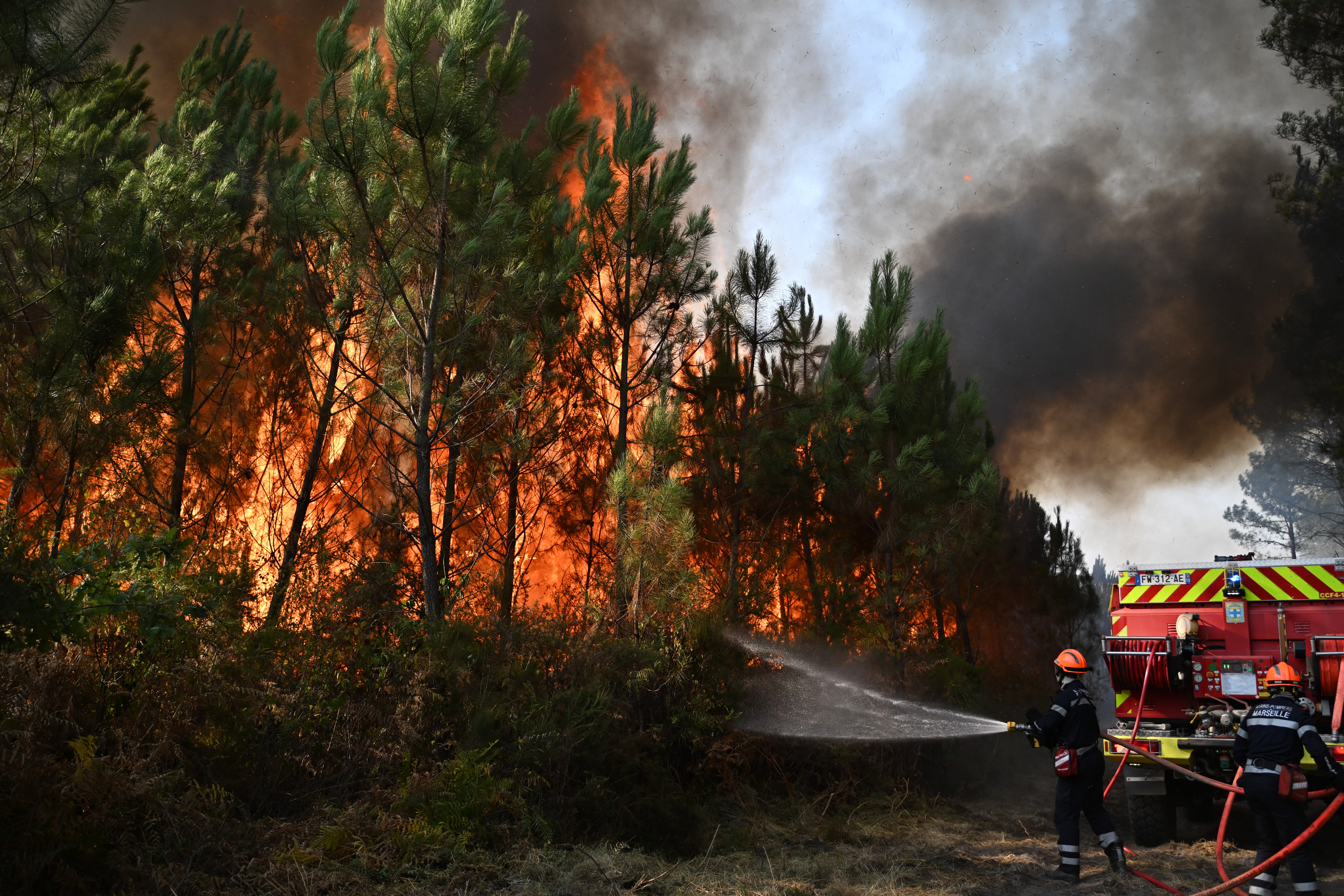 Wildfires rage in France and Spain, forcing mass evacuations