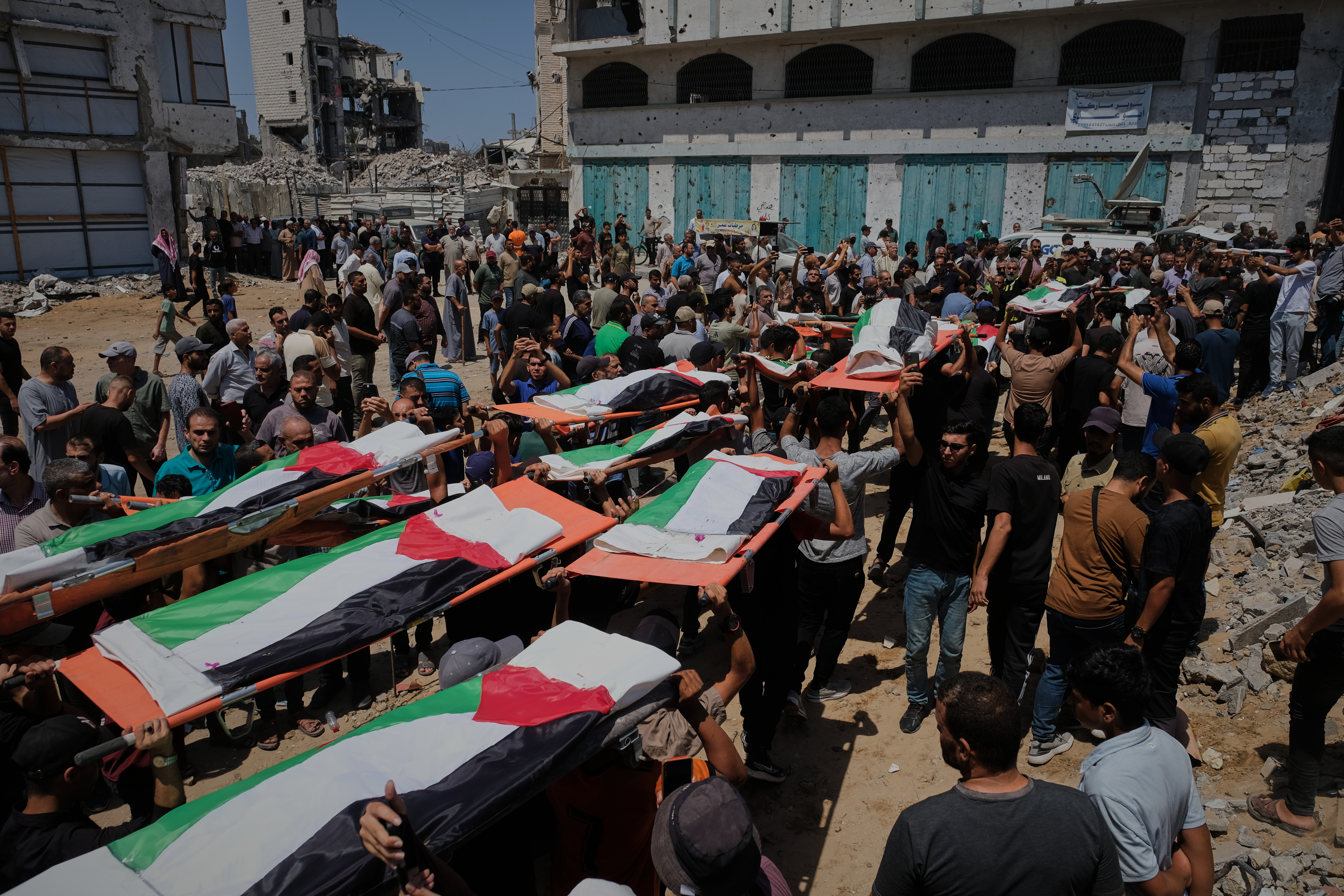 Thousands mourn 112 Palestinians at mass funeral in Gaza City