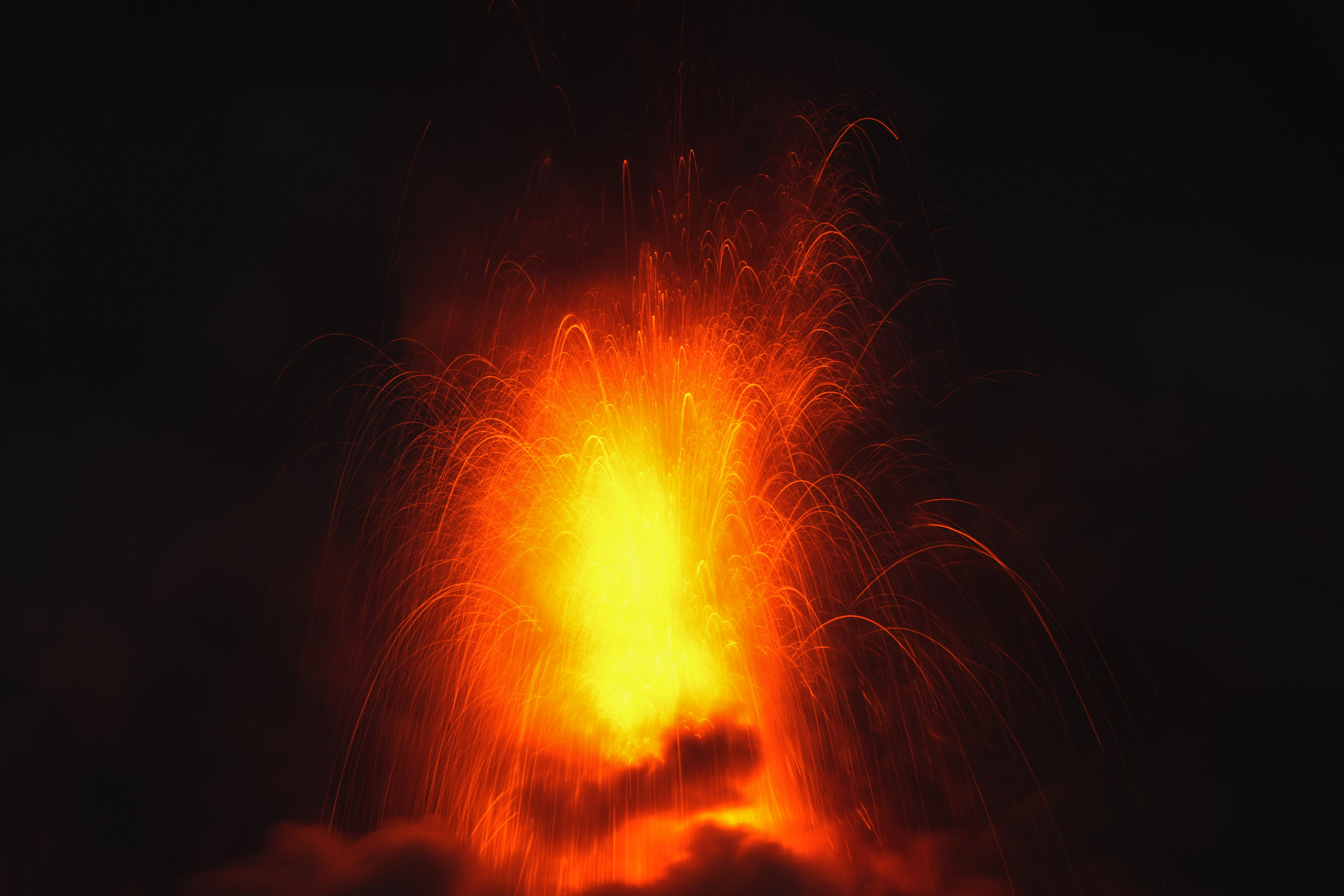 Lava flows out of the crater of the Fuego Volcano