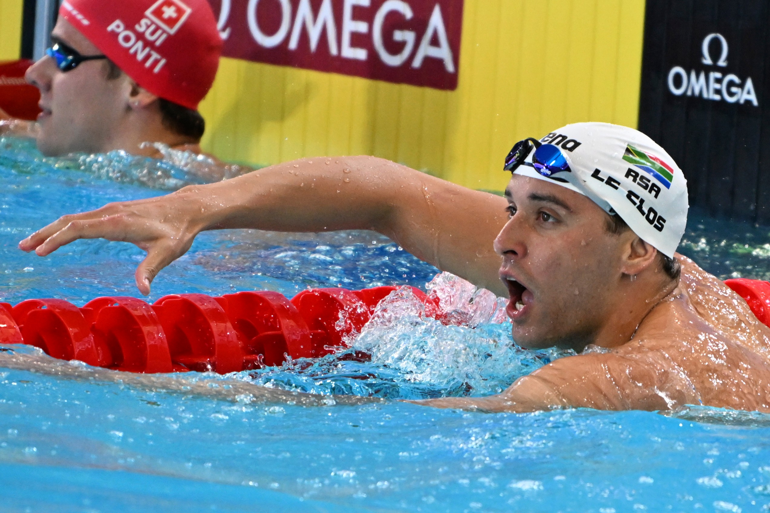 Chad le Clos of South Africa celebrates after winning the men's 100m butterfly final during the world swimming short course championships