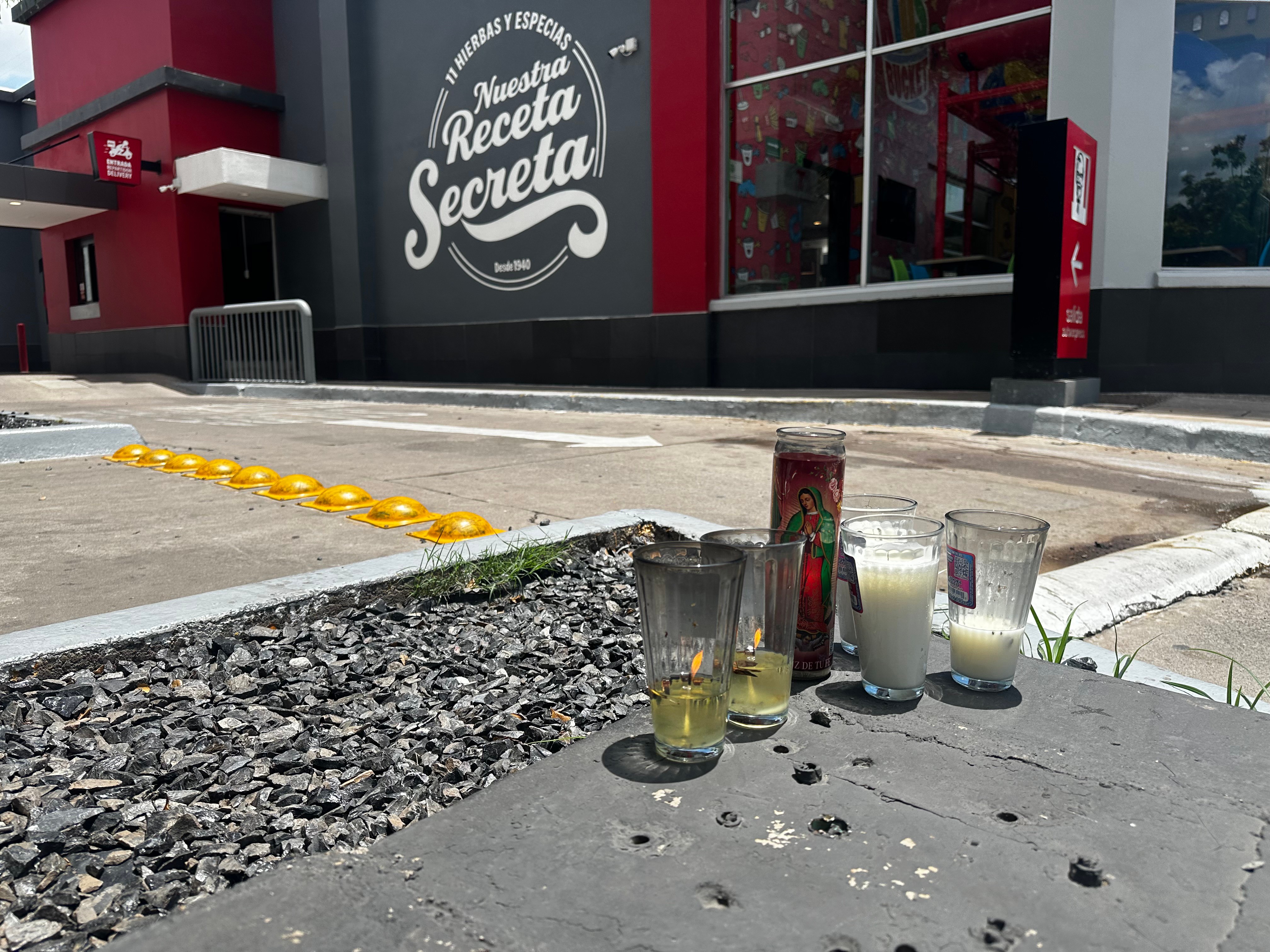 Candles sit near the spot where César Gastélum, a social media influencer, was killed in Culiacán, Mexico, [Aaron Ibarra/AP]