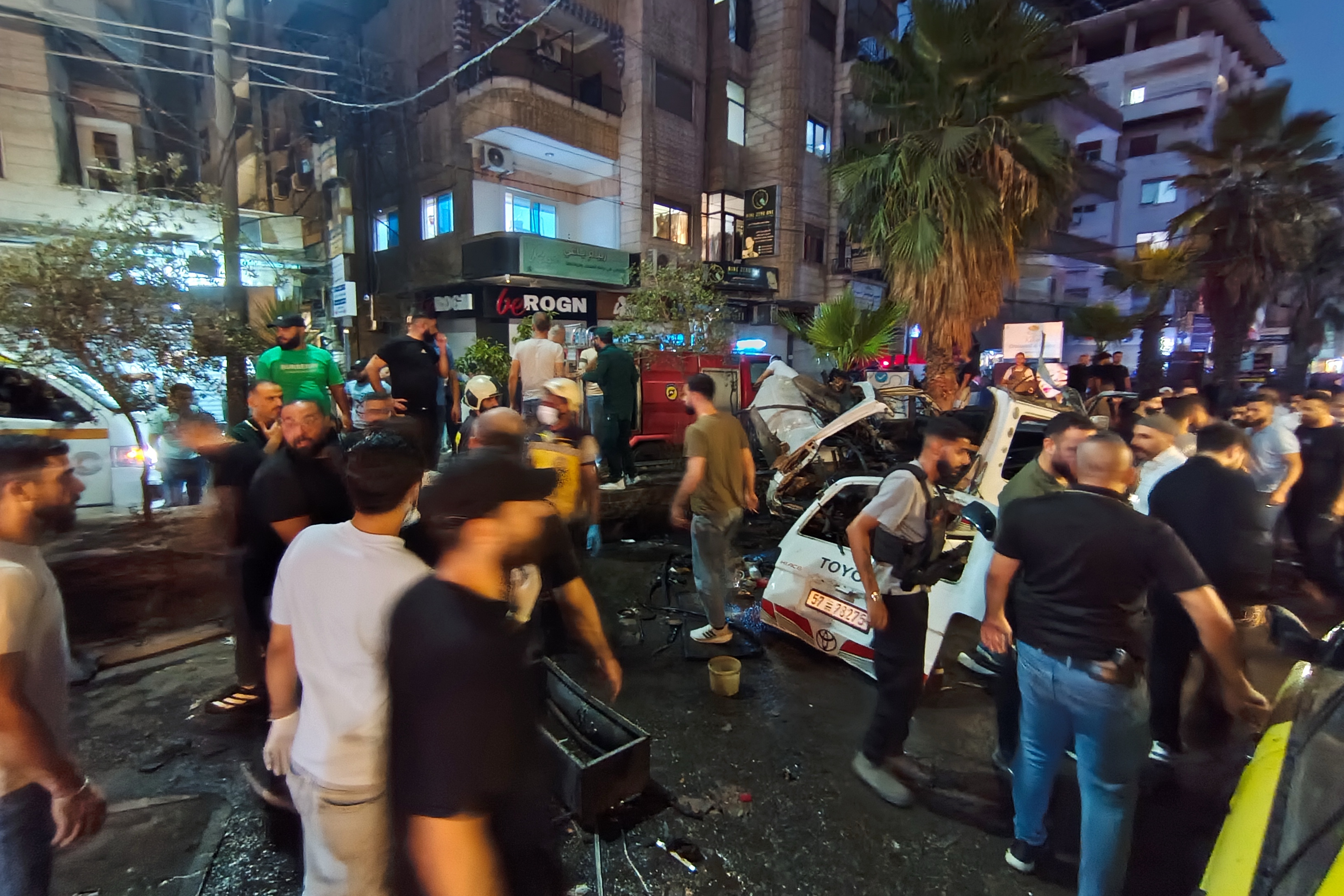 First responders and security personnel work at the site of an explosion in Jaramana, southeast of Damascus, Syria, August 6, 2026
