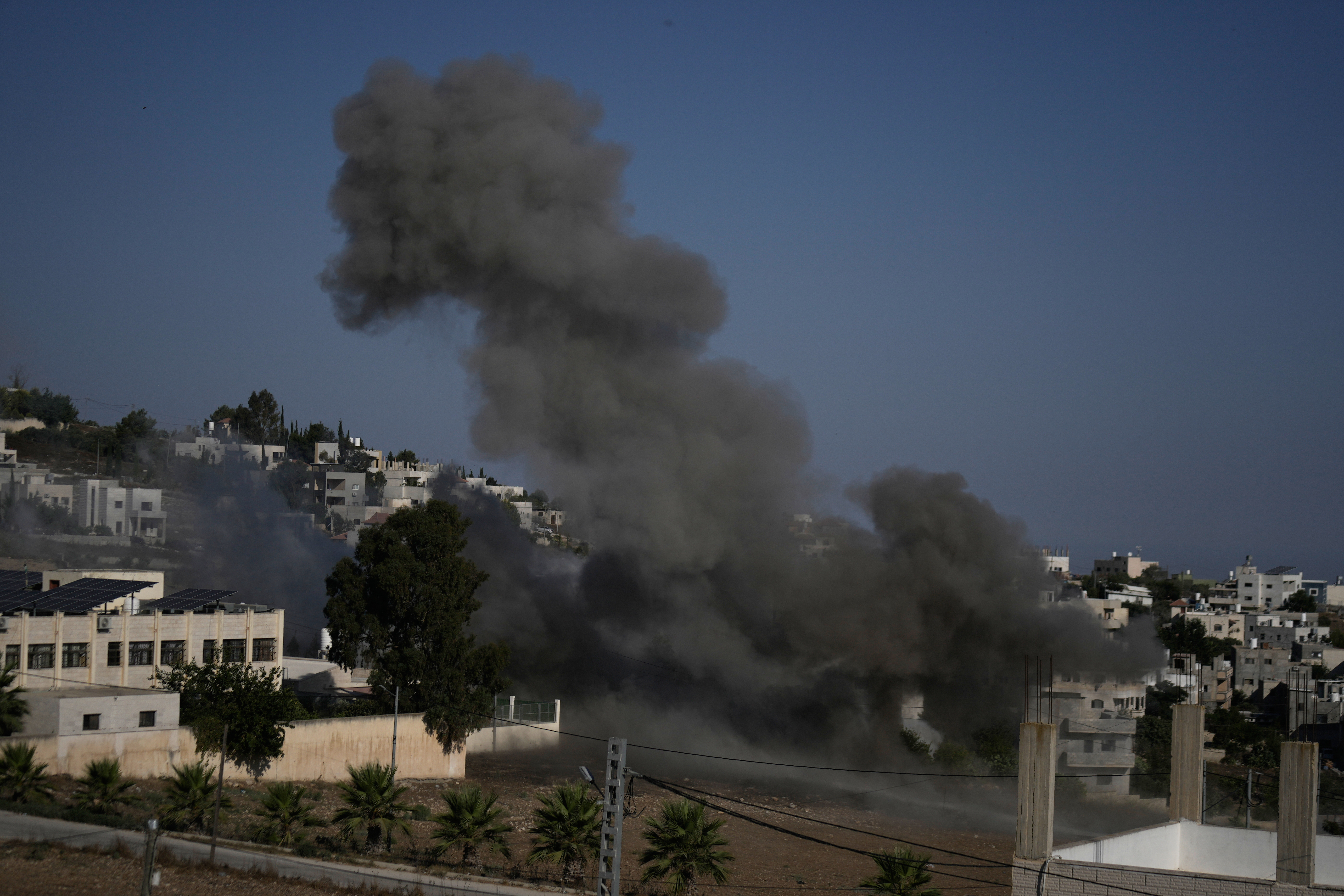 The Israeli army demolish the apartment of Palestinian Farouq Ramadan, in the West Bank village of Tell, near Nablus, Tuesday, Aug. 11, 2026. (AP Photo/Majdi Mohammed)