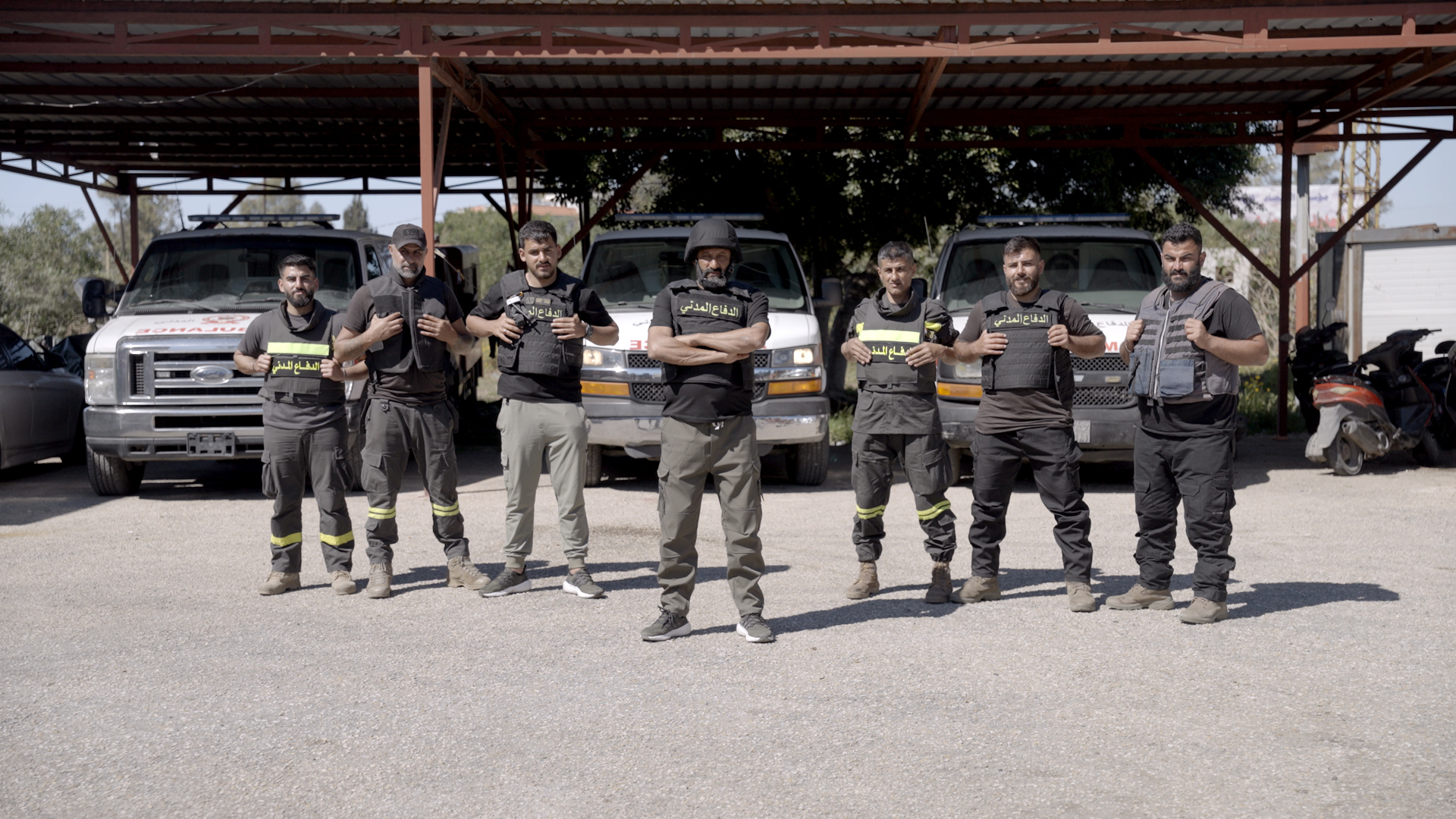 A group of men stand together