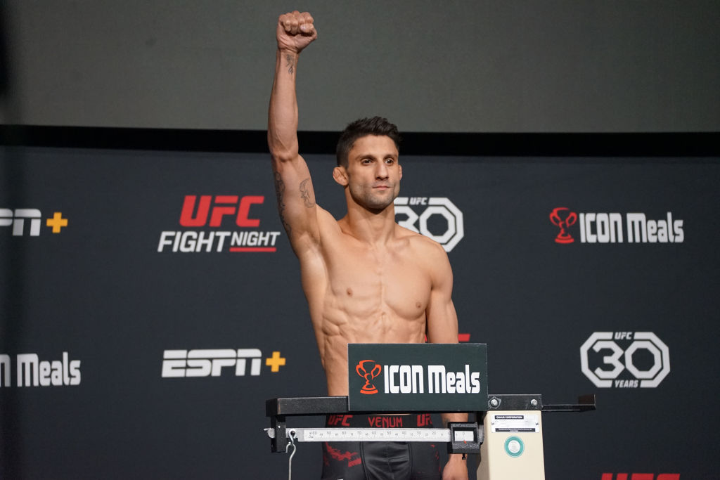 A man weighs in for their UFC Vegas 67 bout on January 13, 2022, at the UFC APEX in Las Vegas