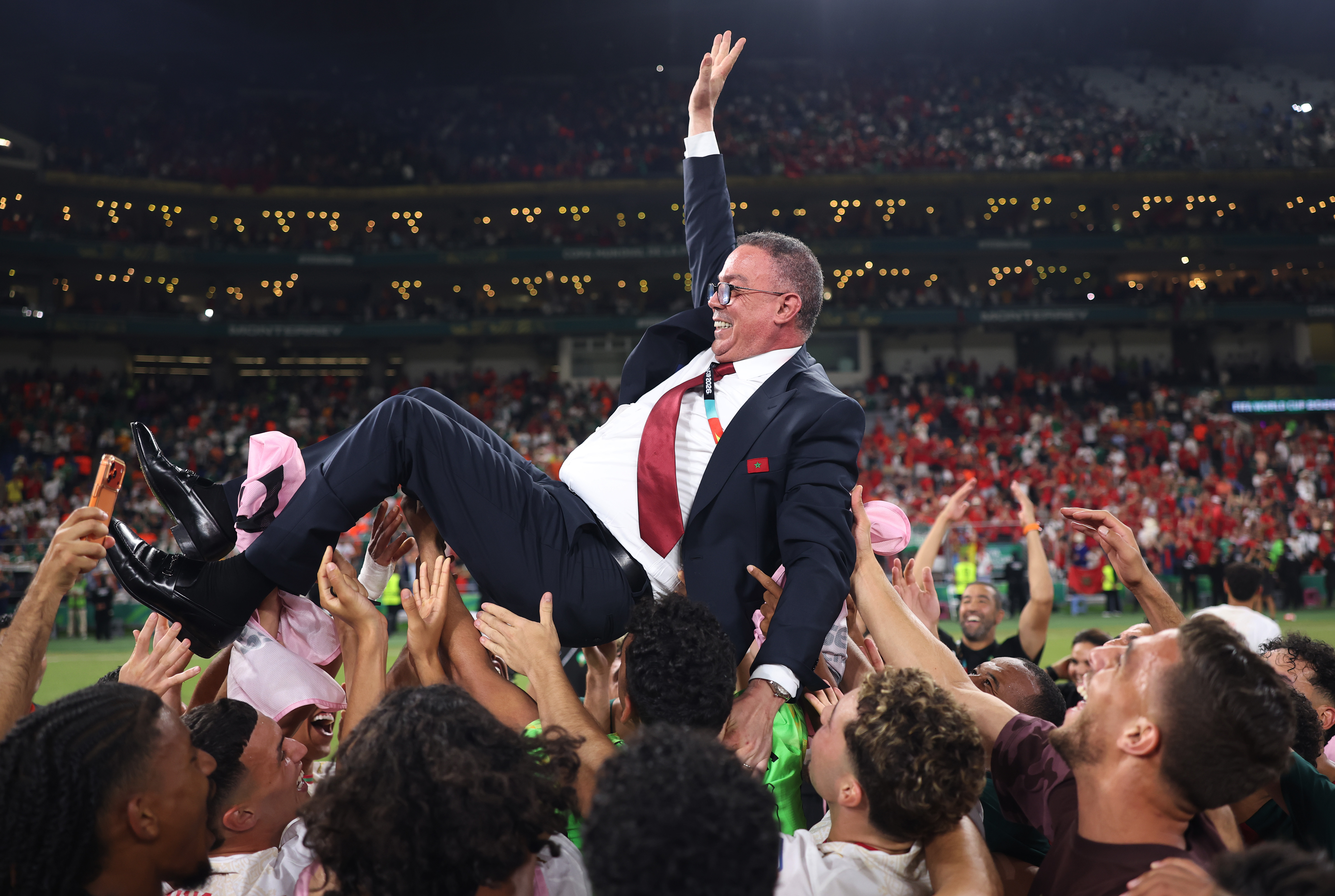 Royal Moroccan Football Federation president Fouzi Lekjaa is tossed into the air by Morocco’s players after their penalty-shootout victory over the Netherlands in the FIFA World Cup 2026 round of 32 in Guadalupe, Mexico