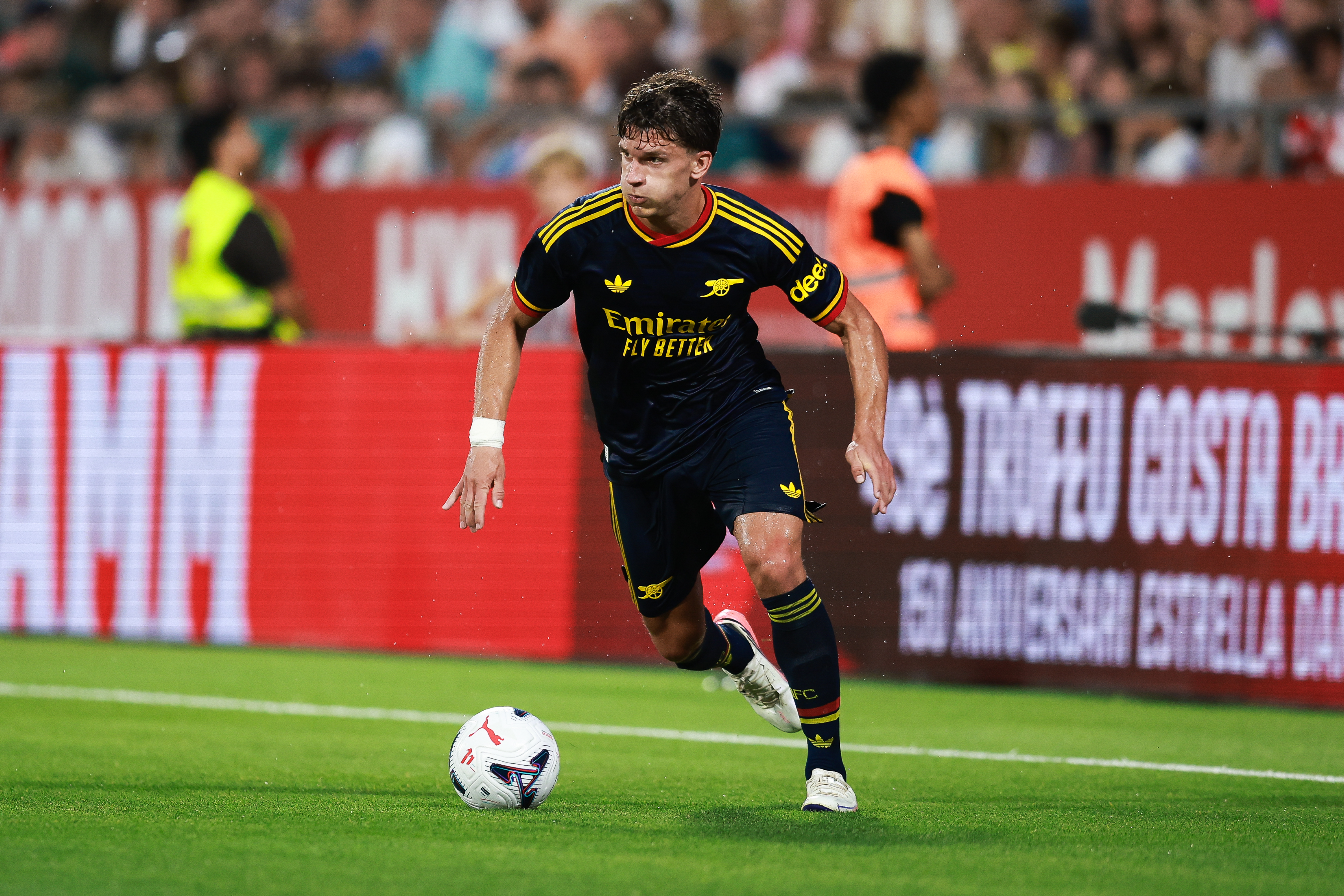 Christos Tzolis runs with the ball