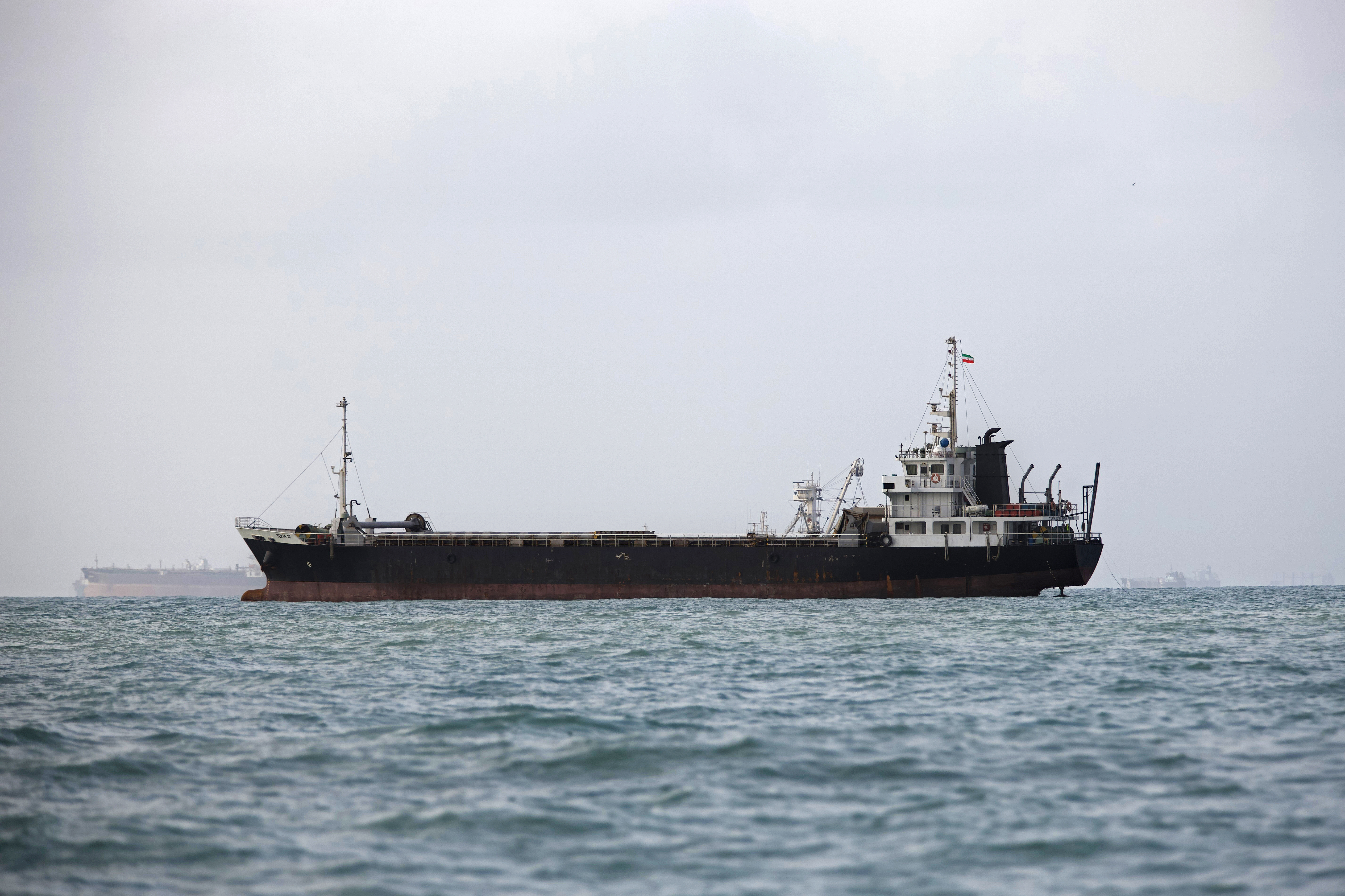 Ships are anchored in the Strait of Hormuz on August 10, 2026 off the coast of Bandar Abbas, Iran