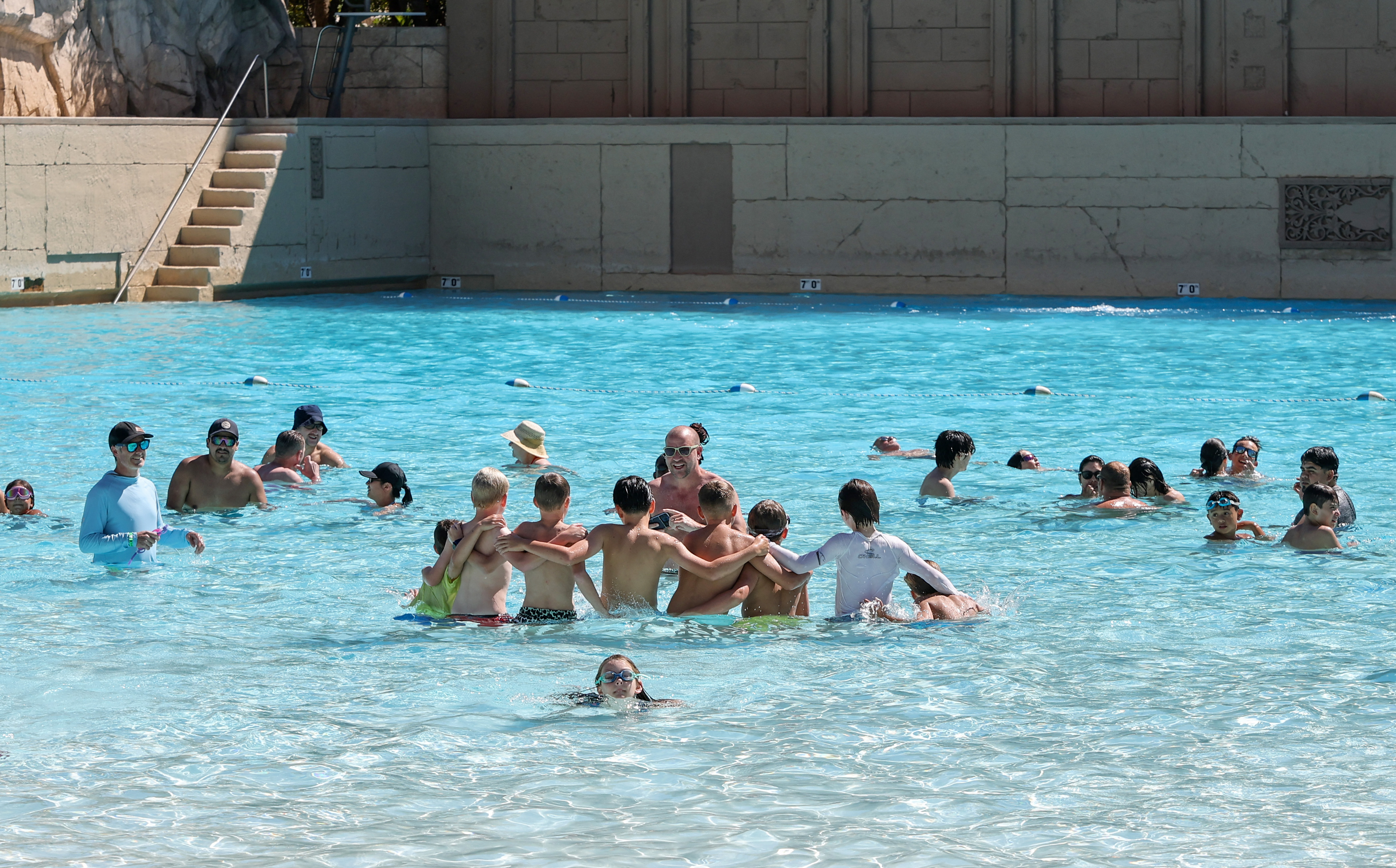 LAS VEGAS, NEVADA - JULY 31: Guests cool off in the wave pool at Mandalay Bay Beach at Mandalay Bay Resort and Casino to escape a heat dome affecting much of the western United States on July 31, 2026 in Las Vegas, Nevada. The National Weather Service issued an extreme heat warning for the Las Vegas Valley through August 2, the second warning in a week, as above-normal temperatures continue, with highs reaching 110 degrees. Ethan Miller/Getty Images/AFP (Photo by Ethan Miller / GETTY IMAGES NORTH AMERICA / Getty Images via AFP)
