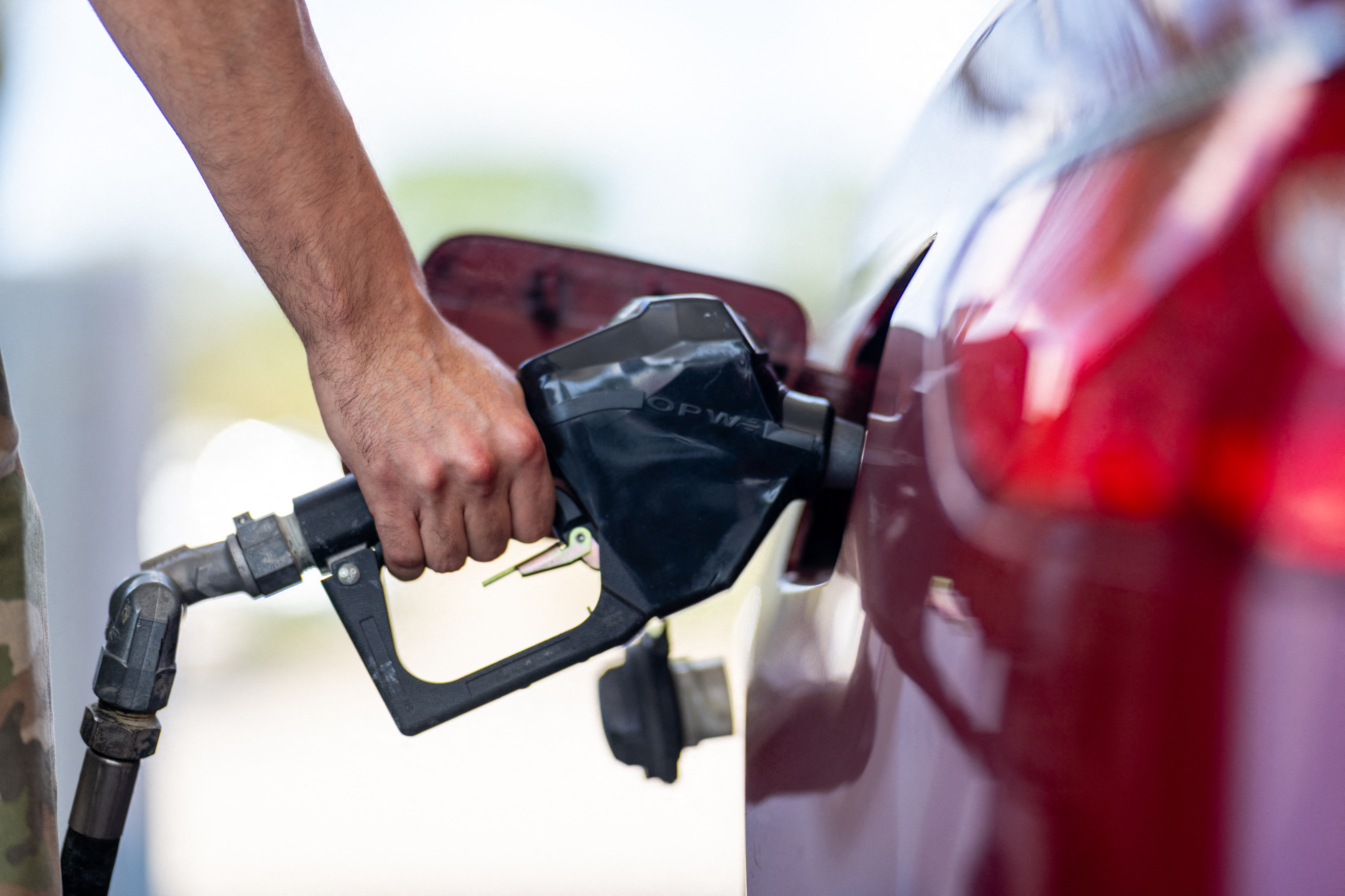 AUSTIN, TEXAS - AUGUST 07: A person pumps gas at a Chevron gas station on August 07, 2026 in Austin, Texas. Gas prices are projected to remain elevated through the fall season as the world continues facing a tight fuel market due to ongoing wars throughout Europe and the Middle East. Brandon Bell/Getty Images/AFP (Photo by Brandon Bell / GETTY IMAGES NORTH AMERICA / Getty Images via AFP)