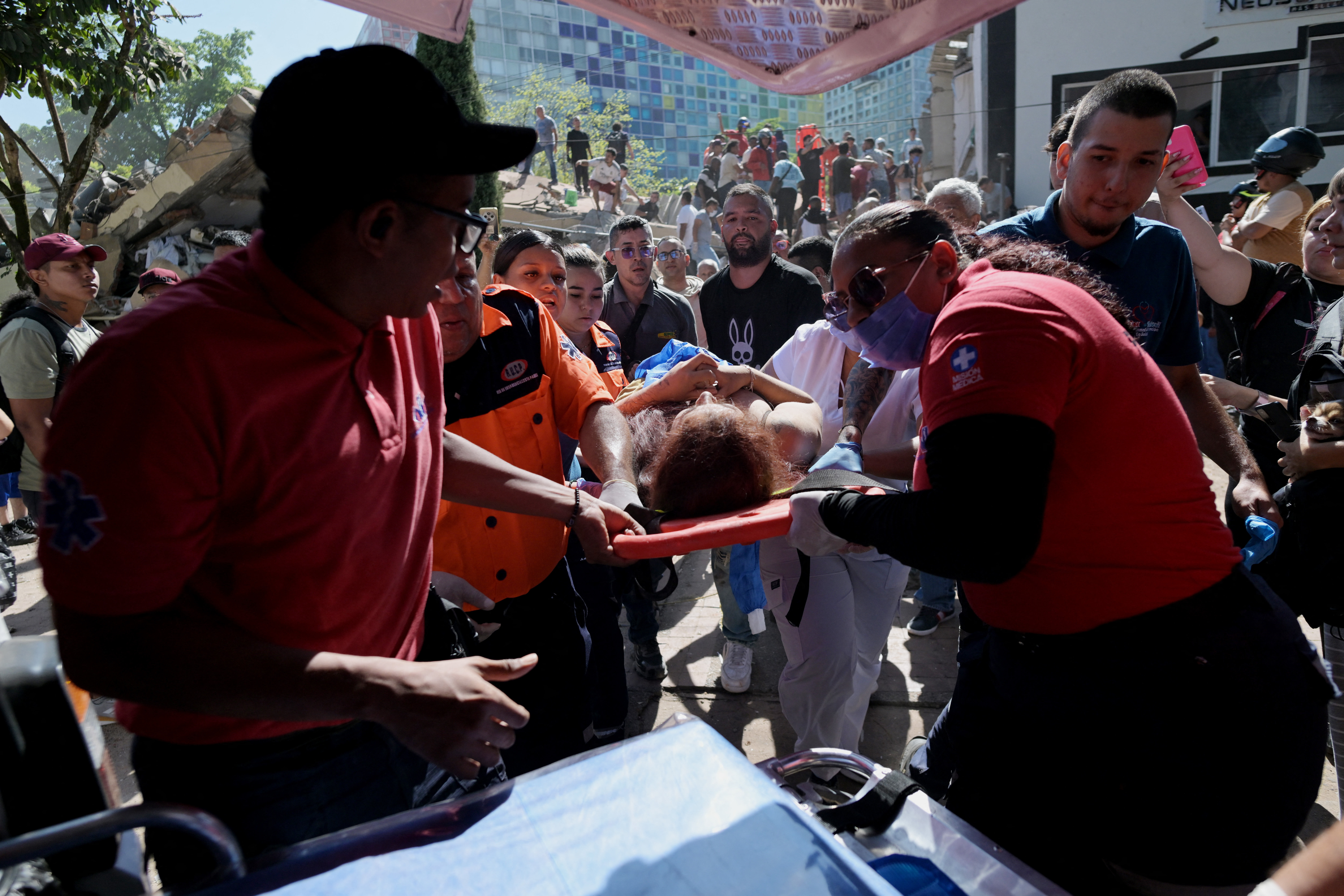 A woman is rescued from a collapsed building after an earthquake in Cali, Colombia on August 10, 2026.