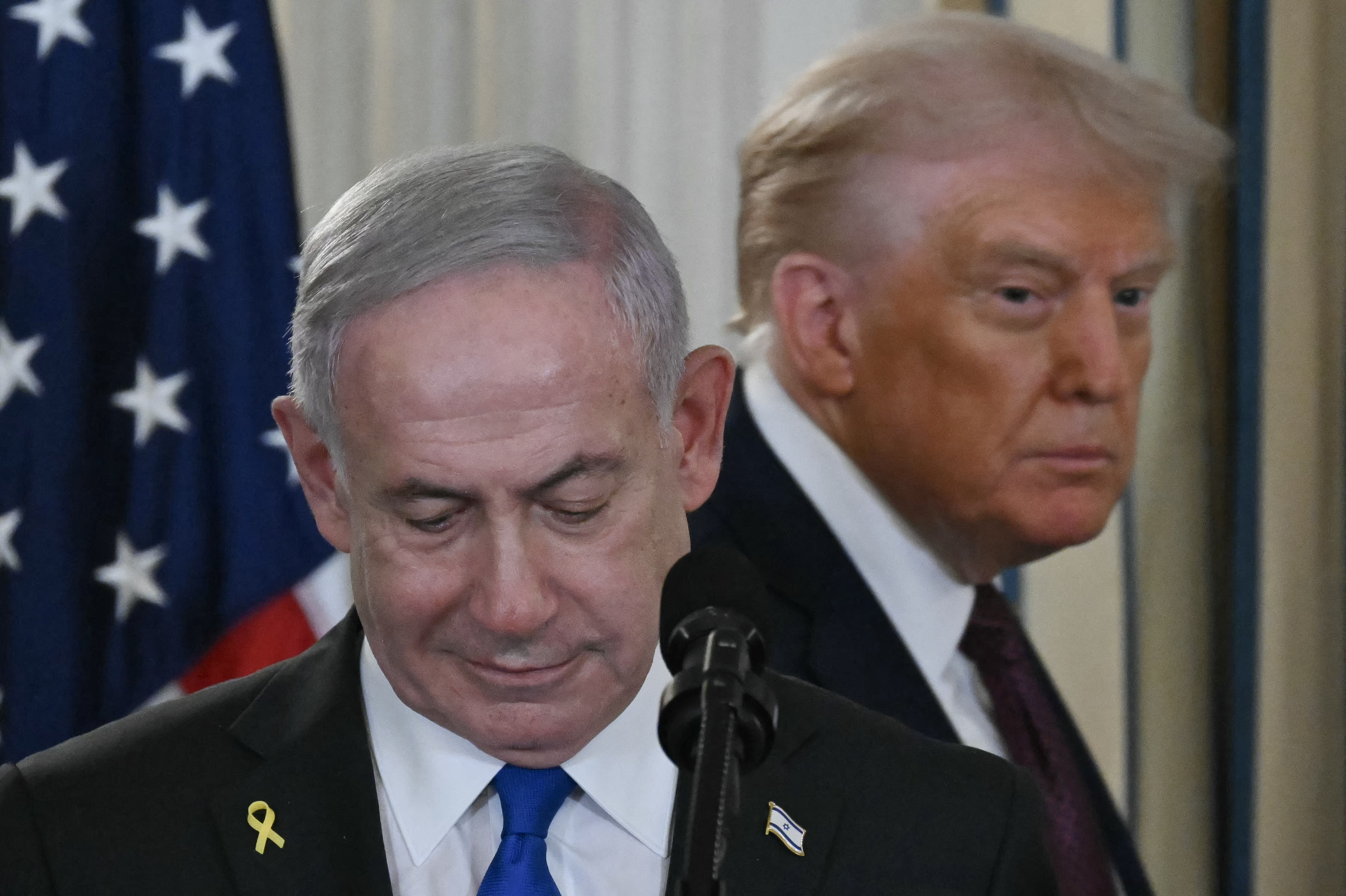 (FILES) US President Donald Trump and Israeli Prime Minister Benjamin Netanyahu (L) arrive for a press conference in the State Dining Room of the White House in Washington, DC on September 29, 2025.