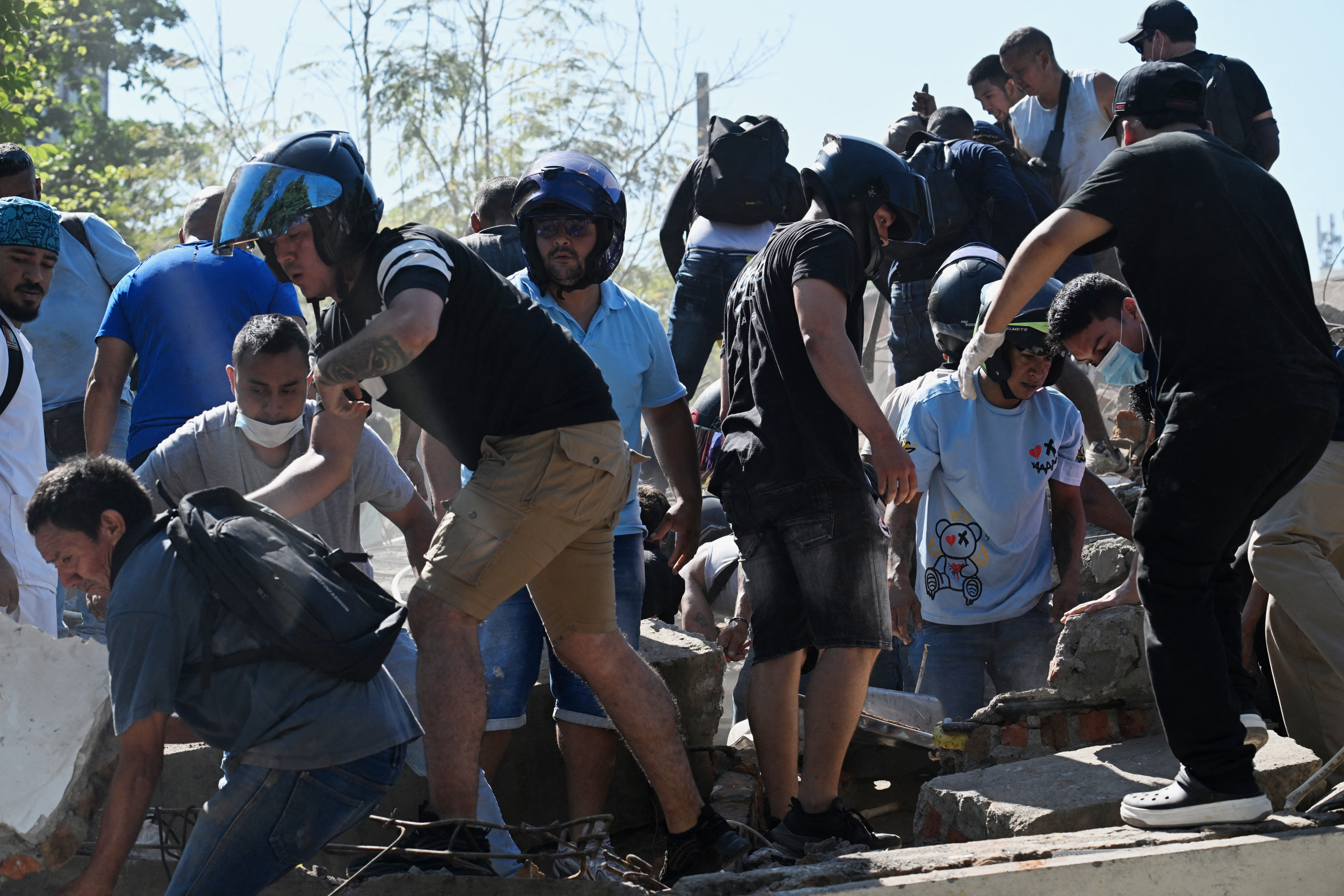 People work on a collapsed building after an earthquake in Cali, Colombia on August 10, 2026.