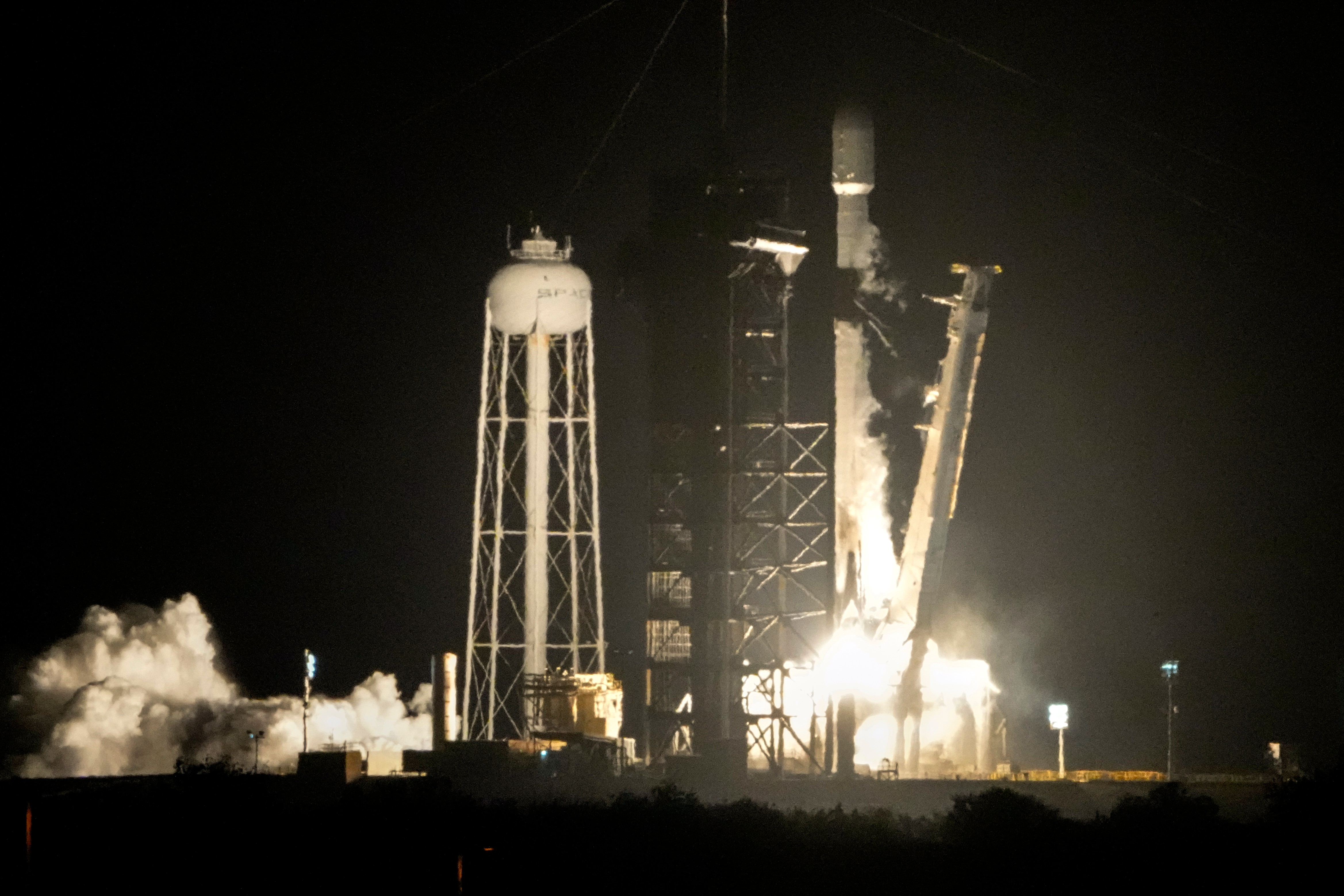 A rocket lifts off.