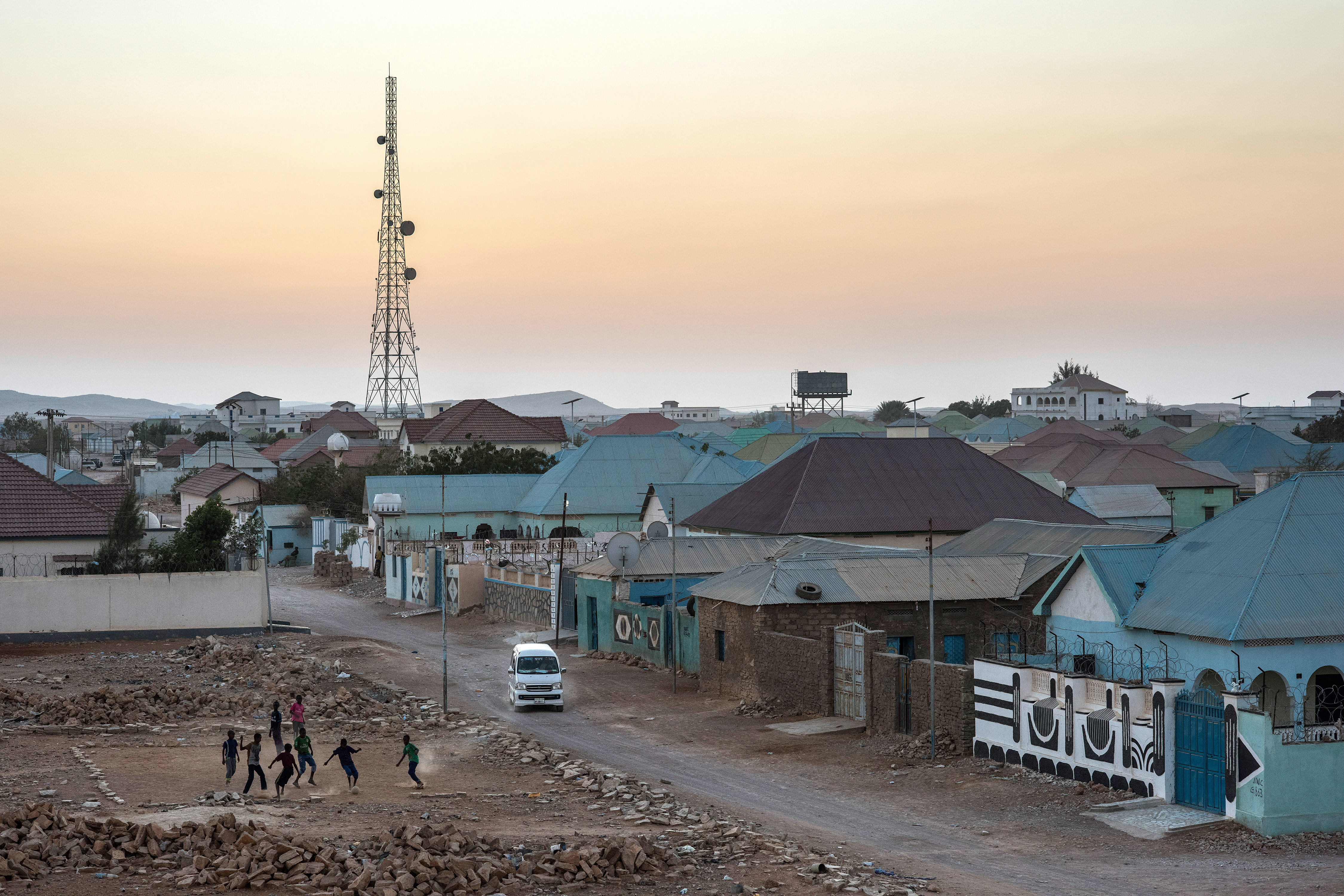 GAROWE, SOMALIA - FEBRUARY 27: Boys play football in an empty lot on February 27, 2017 in Garowe, Somalia. Somalia is currently on the brink of famine with over half of the country's population facing acute food insecurity according to the United Nations. The intensifying crisis has humanitarian groups racing to stop a repeat of 2011, in which 260,000 people died of famine throughout country. (Photo by Andrew Renneisen/Getty Images)