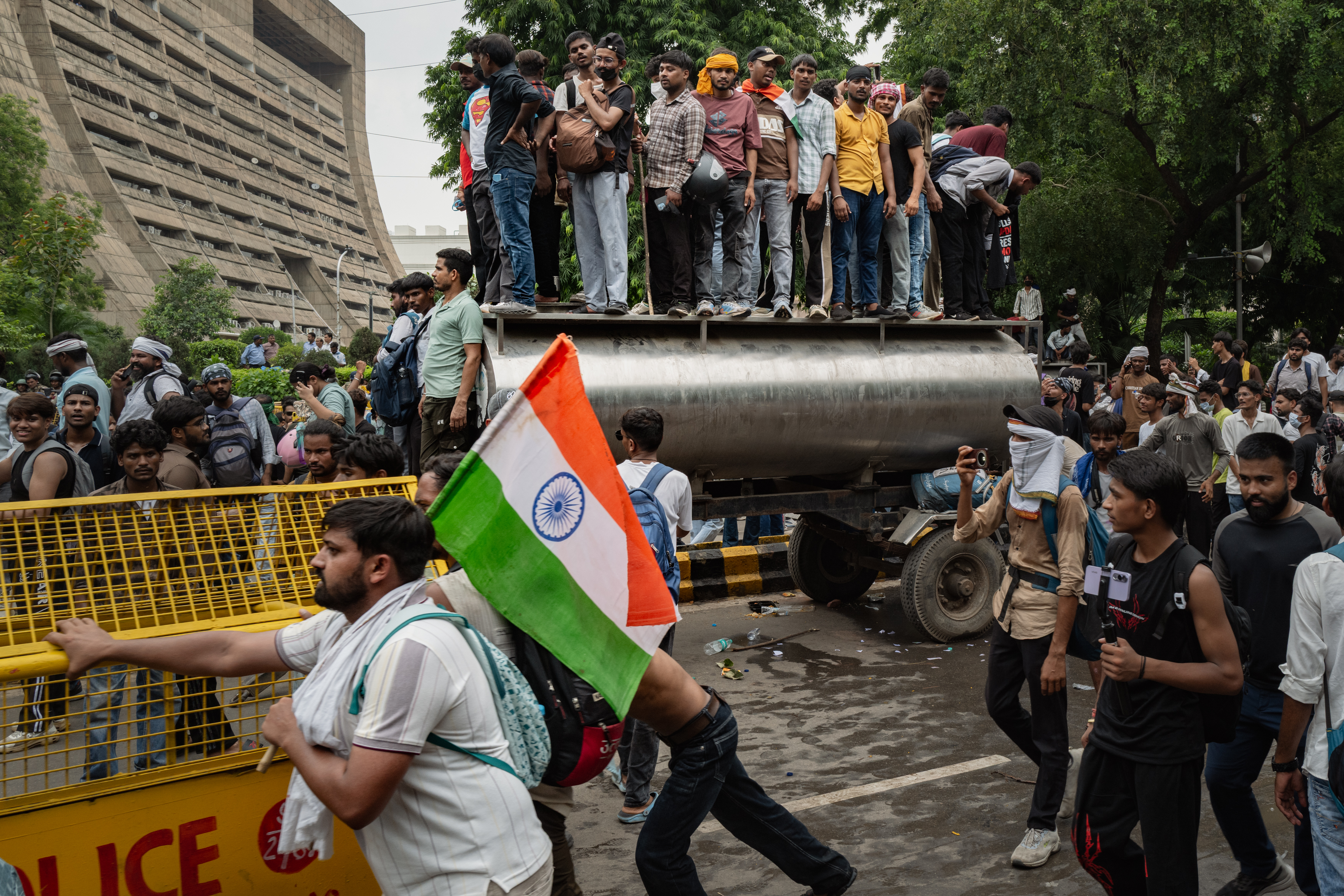 Supporters of India's Cockroach Janta Party (CJP) celebrate.