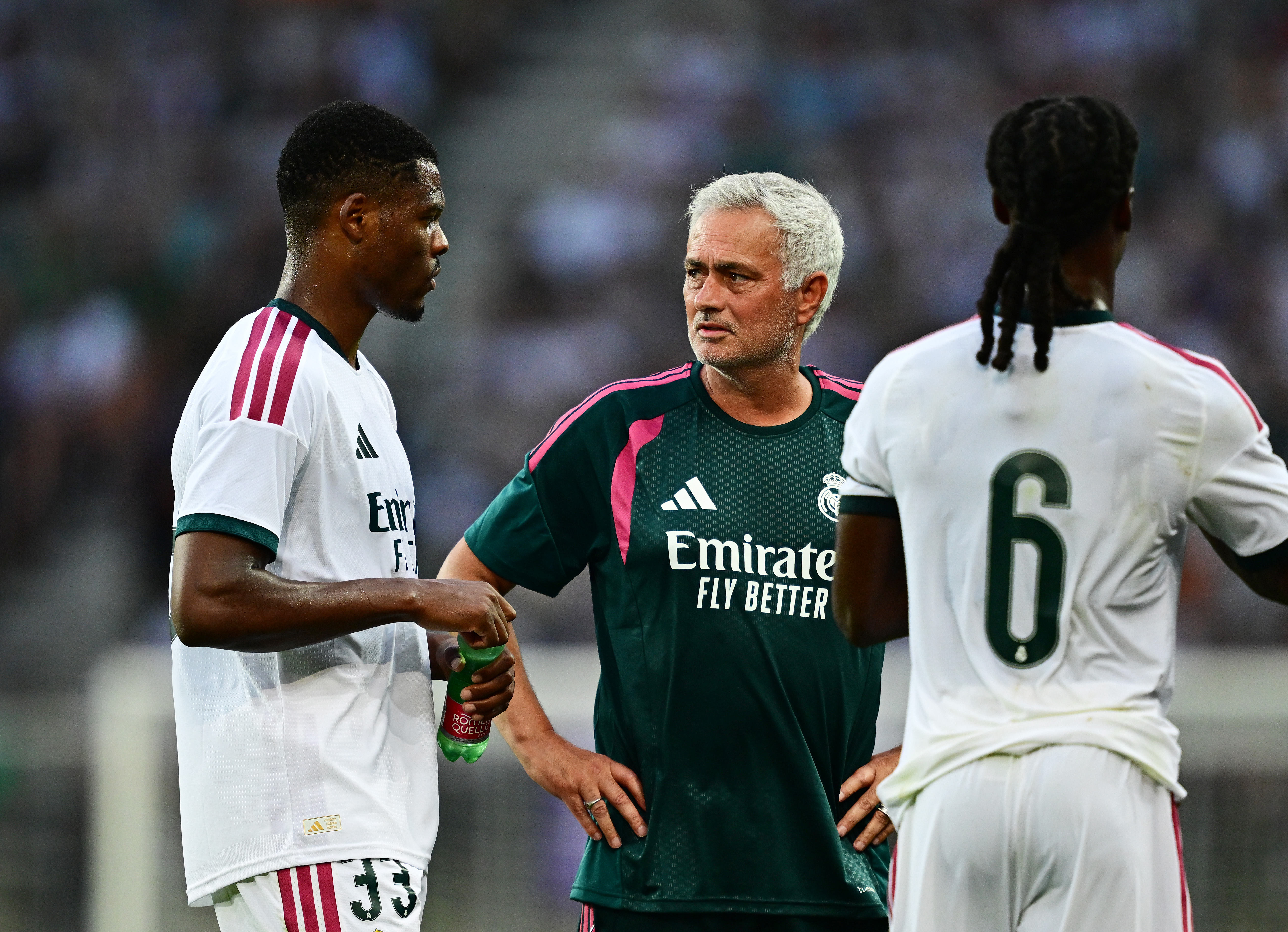 KLAGENFURT, AUSTRIA - AUGUST 01: Jose Mourinho, Head Coach of Real Madrid, speaks with Denzel Dumfries of Real Madrid during the pre-season friendly match between Real Madrid and Fiorentina at Woerthersee Stadion on August 01, 2026 in Klagenfurt, Austria. (Photo by Christian Bruna/Getty Images)