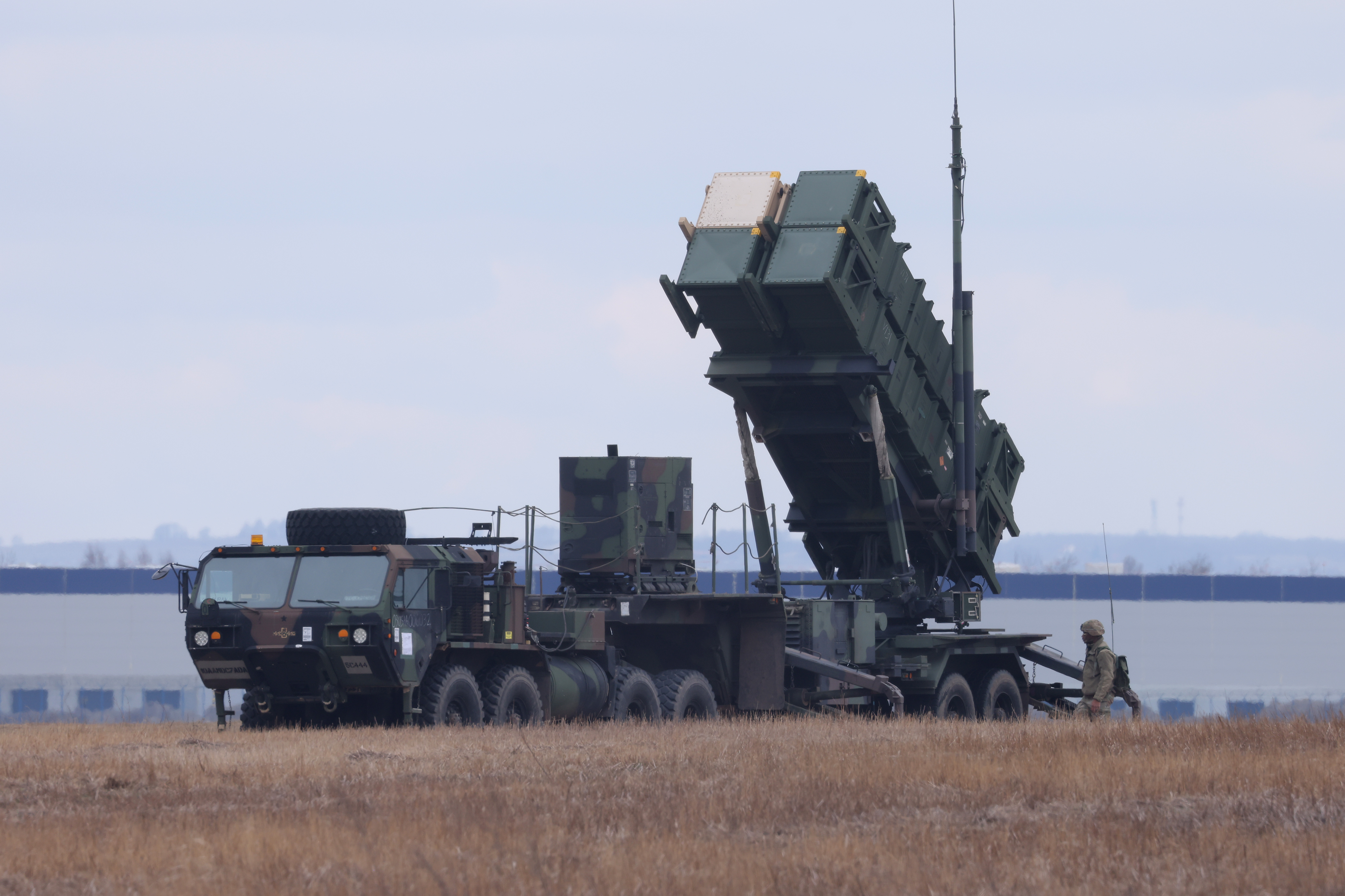 RZESZOW, POLAND - MARCH 08: A U.S. Army MIM-104 Patriot anti-missile defence launcher stands pointing east at Rzeszow Jasionska airport, an airport currently being used by the U.S. Army's 82nd Airborne Division, on March 08, 2022 near Rzeszow, Poland. The U.S., in response to the Russian military buildup and subsequent invasion of Ukraine, and in concert with other NATO member states deploying additional troops across eastern European countries, has sent thousands of troops to southeastern Poland, where they have set up bases at Rzeszow and at least three smaller airfields, all not far from Poland's border to Ukraine. Meanwhile fighting between the Russian military and Ukrainian armed forces is continuing across Ukraine. (Photo by Sean Gallup/Getty Images)