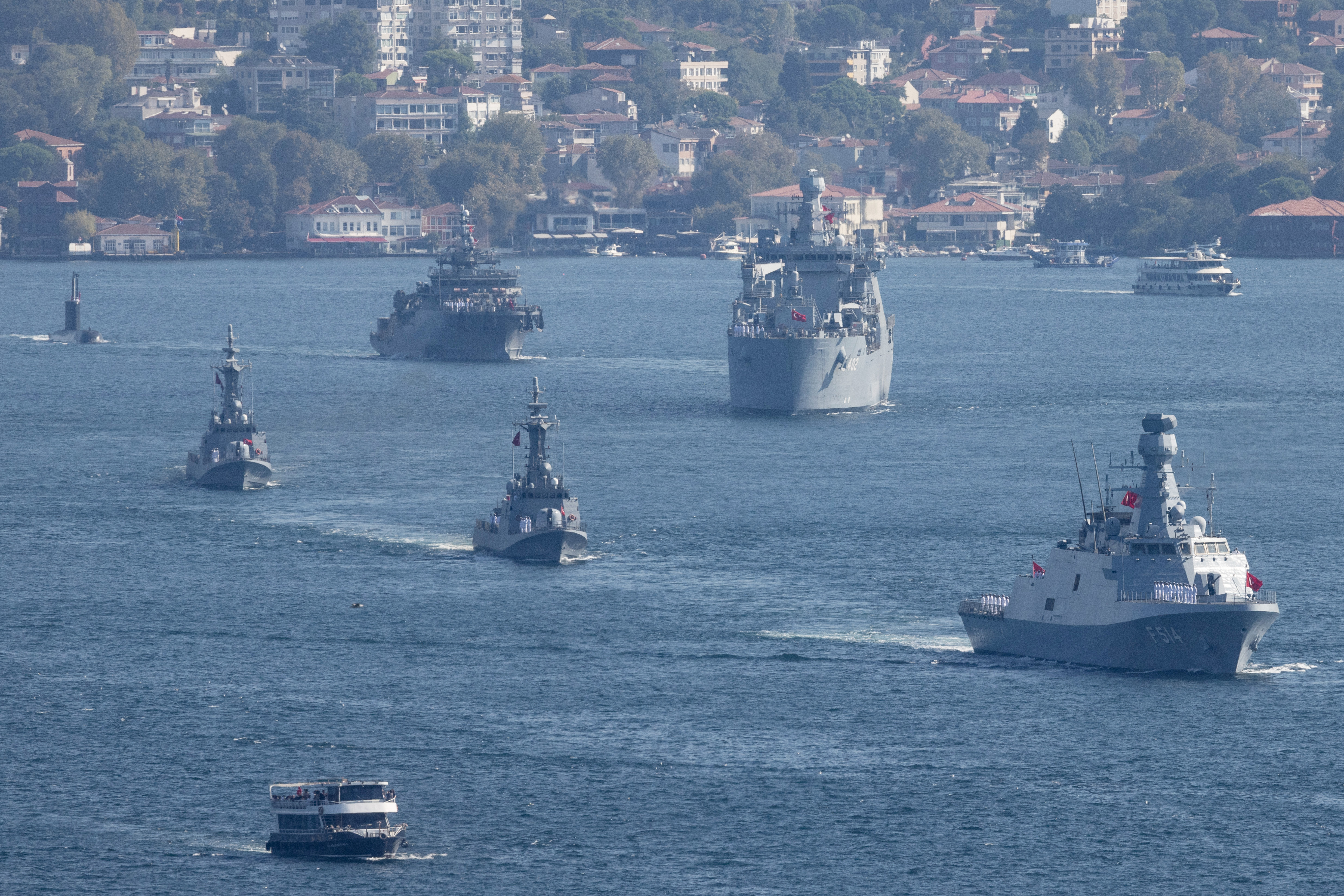 ISTANBUL, TURKEY - SEPTEMBER 27: Turkish Navy vessels navigate the Bosphorus in a parade to mark the 486th anniversary of the Naval victory of Preveza and naval forces day on September 27, 2024 in Istanbul, Turkey. 16 vessels from the Turkish Naval Forces Command took part in the parade. (Photo by Chris McGrath/Getty Images)