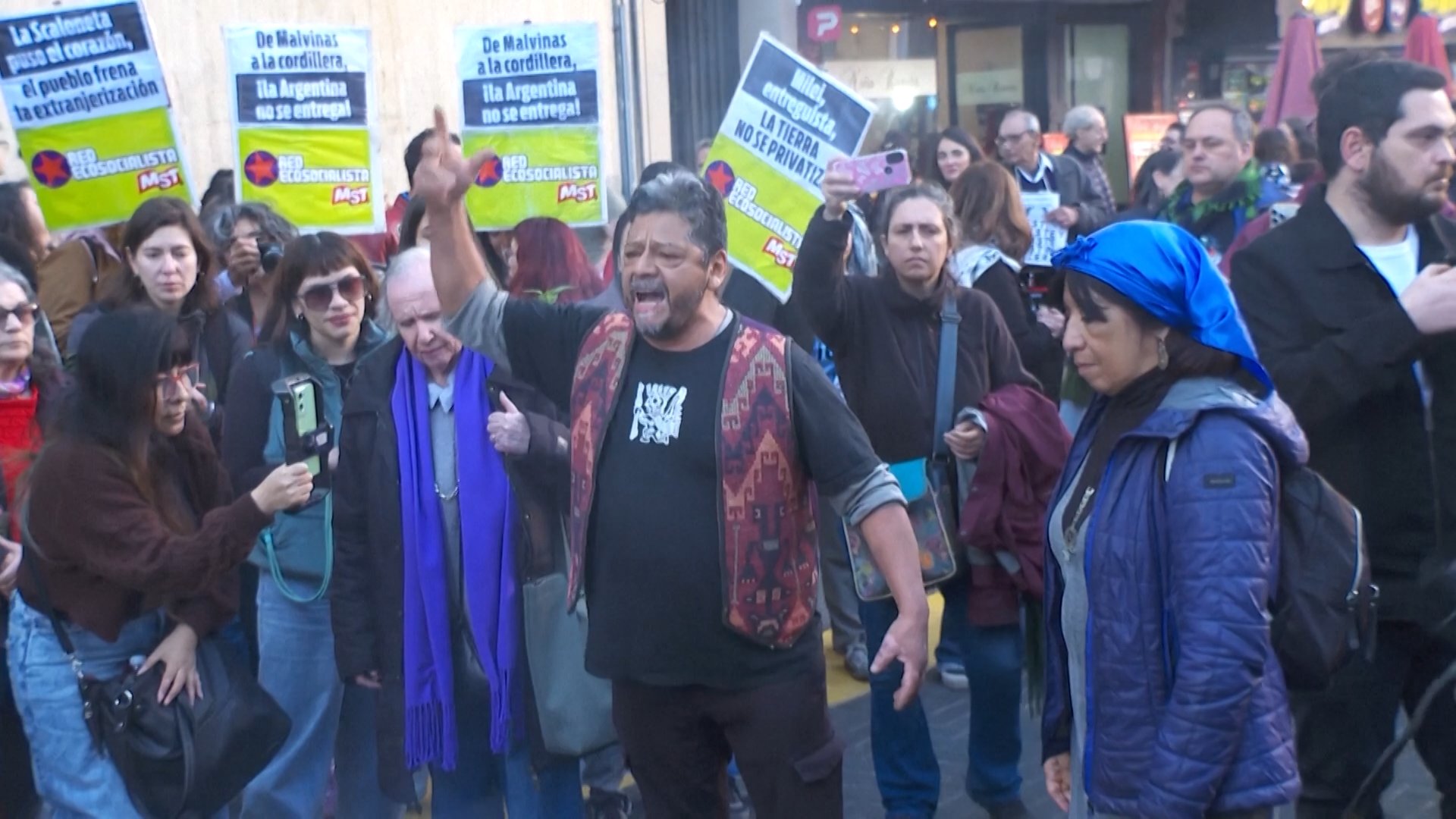 Indigenous groups, activists rally in Buenos Aires against Milei's land foreignization law. [Screenshot]