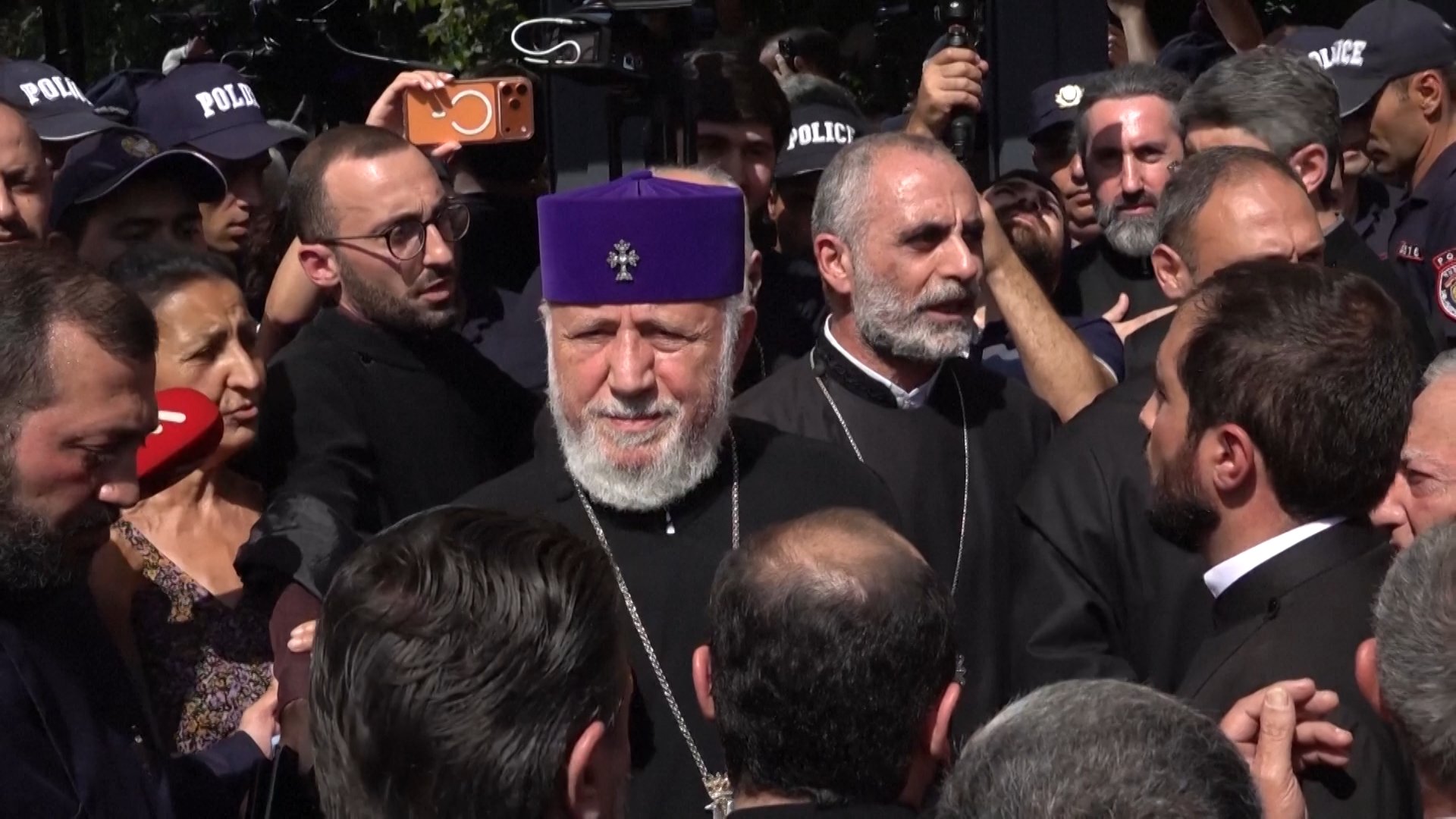 The supreme head of the Armenian Apostolic Church Catholicos Karekin II attending his trial over allegations of serving foreign powers, including Russia. Vagharshapat, Armenia, August 7, 2026 [Screenshot from Reuters Agency File]