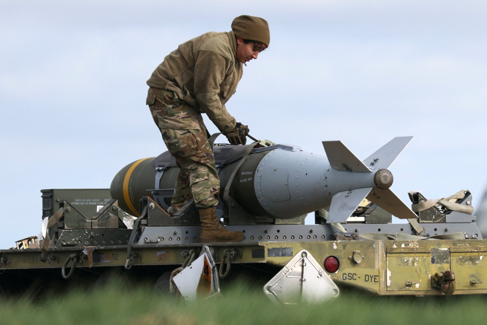 A member of the ground crew works with munitions at RAF Fairford airbase, used by USAF personnel, amid the US-Israeli war on Iran, in Fairford, Gloucestershire, Britain, March 15, 2026. REUTERS/Jack Taylor