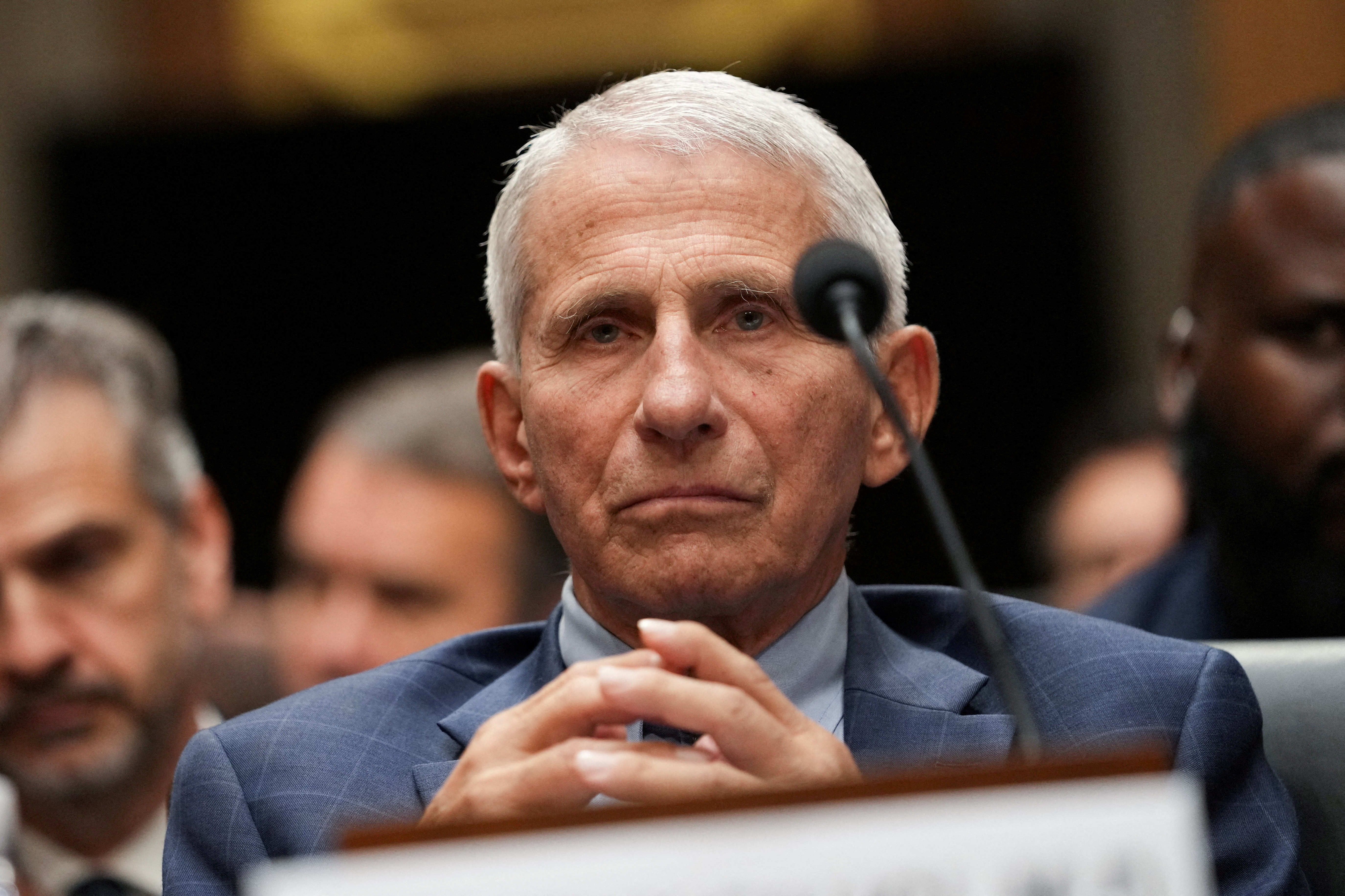 FILE PHOTO: Anthony Fauci, the former Director of the National Institute of Allergy and Infectious Diseases (NIAID) and medical advisor to several U.S. presidents, attends a U.S. Senate Homeland Security and Governmental Affairs Committee on Capitol Hill in Washington, D.C., U.S., July 29, 2026. Anthony Fauci declined to answer questions, invoking his Fifth Amendment right against self-incrimination. REUTERS/Nathan Howard/File Photo