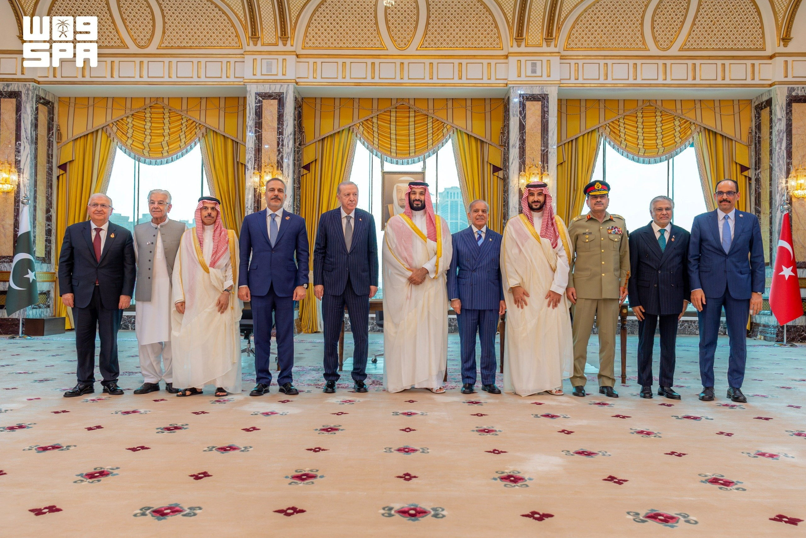 Turkish President Tayyip Erdogan, Saudi Crown Prince Mohammed bin Salman, and Pakistan's Prime Minister Shehbaz Sharif, accompanied by their ministers of Foreign Affairs and Defence, pose after signing a joint defence agreement in Mecca, Saudi Arabia, August 7, 2026. Saudi Press Agency/Handout via REUTERS ATTENTION EDITORS - THIS PICTURE WAS PROVIDED BY A THIRD PARTY. WATERMARK FROM SOURCE