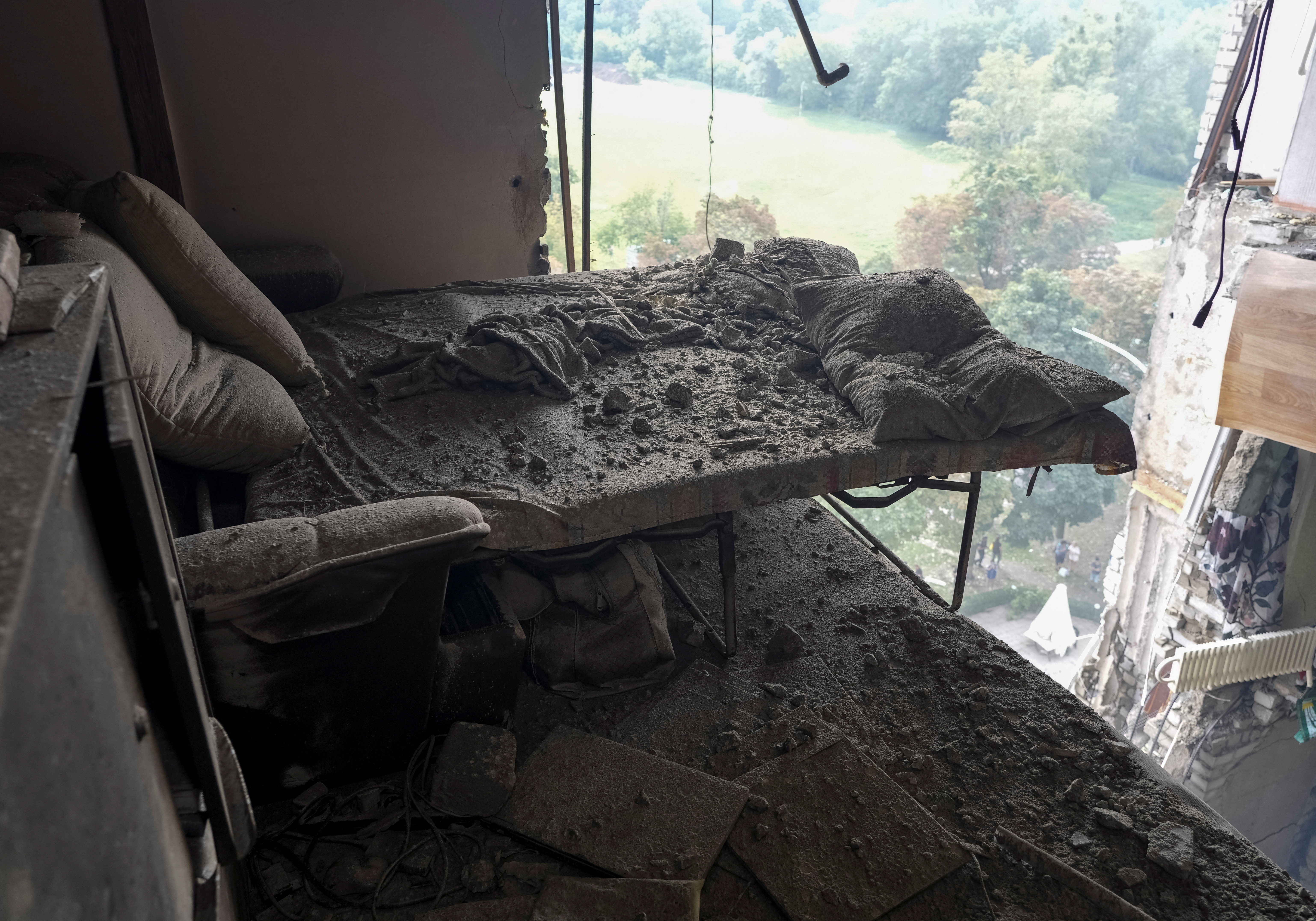 The interior of a damaged flat in an apartment building hit by a Russian drone strike, amid Russia's attack on Ukraine, in Kharkiv, Ukraine August 9, 2026. REUTERS/Vitalii Hnidyi