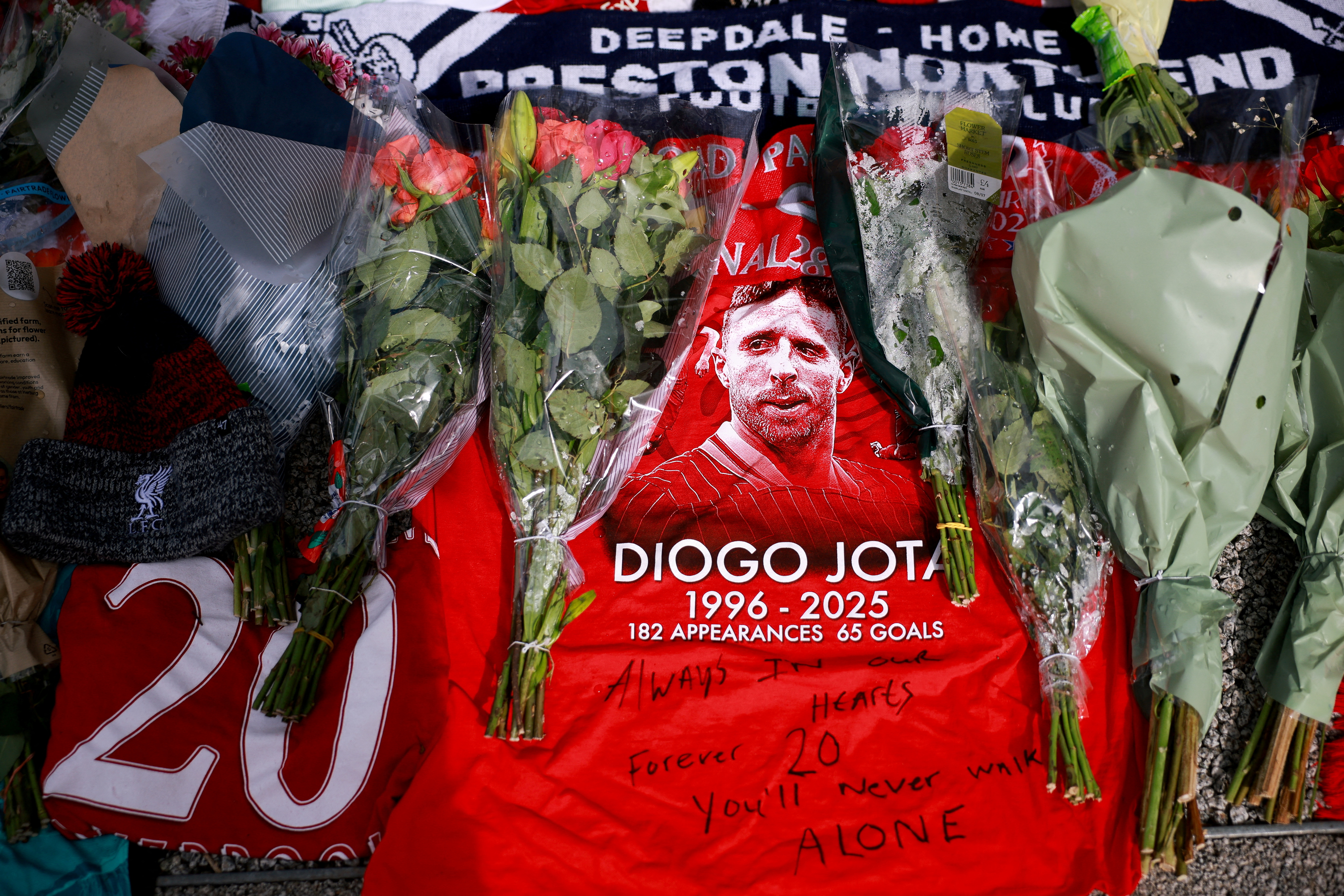 Tributes are placed outside Anfield Stadium, following the death of Liverpool Football Club soccer player Diogo Jota, in Liverpool, Britain, July 7, 2025. REUTERS/Phil Noble TPX IMAGES OF THE DAY
