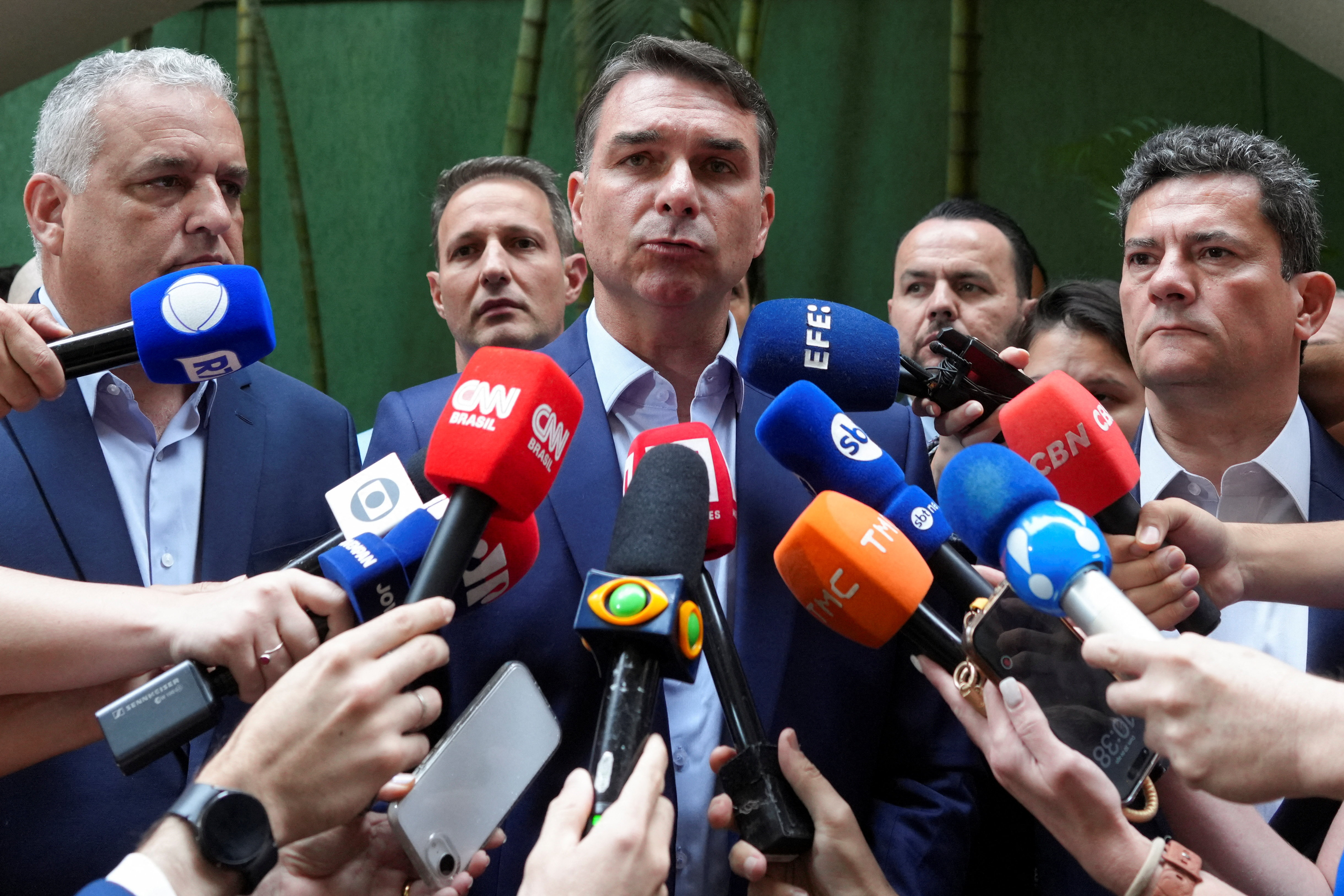 Presidential candidate Flavio Bolsonaro speaks during a press conference after a meeting with El Salvador's Minister of Security Gustavo Villatoro (not pictured) beside vice-presidential candidate Alfredo Gaspar and candidate for governor of Parana state Sergio Moro, in Sao Paulo, Brazil August 30, 2026. REUTERS/Alexandre Meneghini