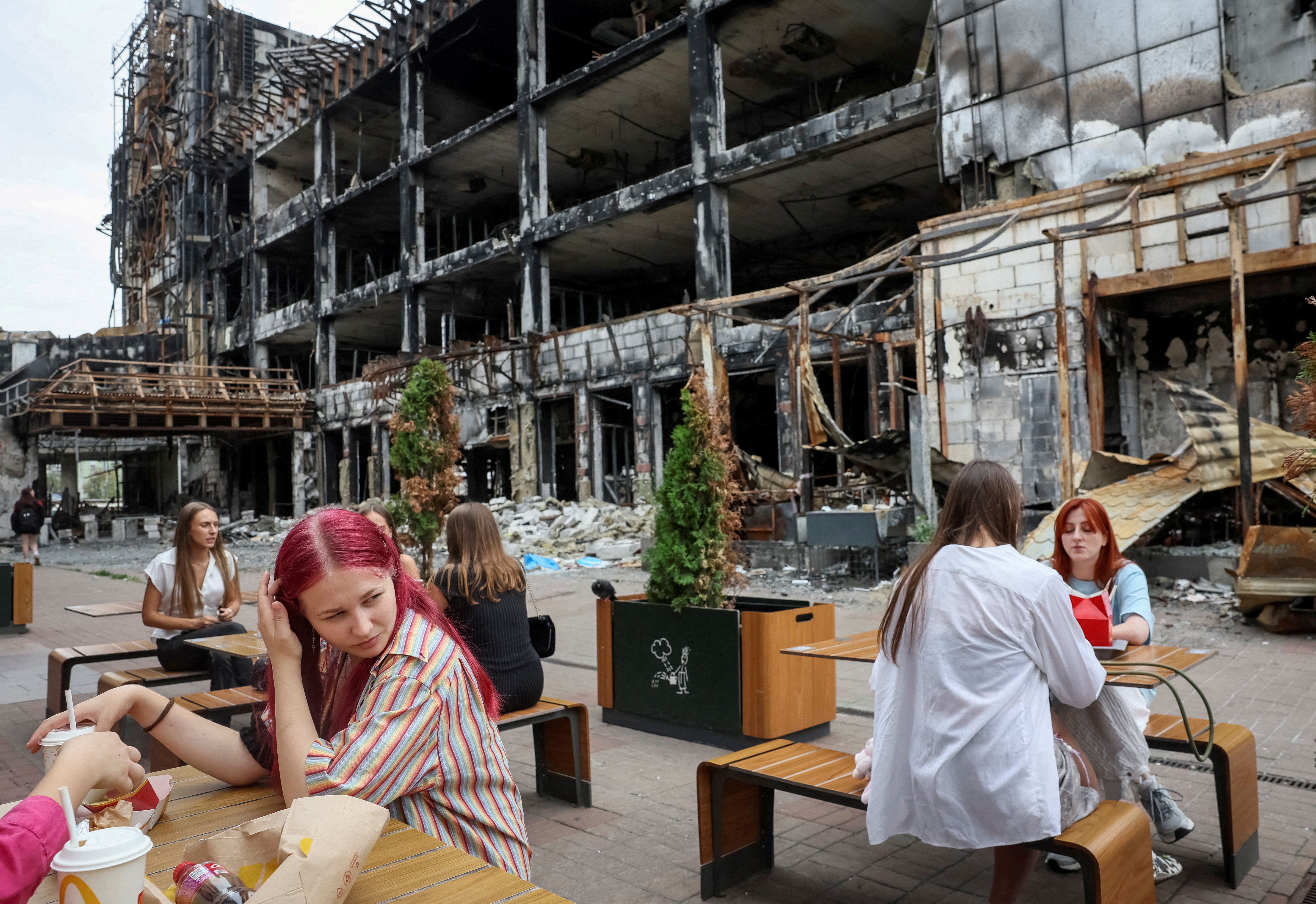 People visit a McDonald's restaurant which was the first to open in Ukraine in 1997, located in an area that was hit by numerous missile attacks, amid Russia's attack on Ukraine, in Kyiv, Ukraine, September 1, 2026. REUTERS/Gleb Garanich TPX IMAGES OF THE DAY