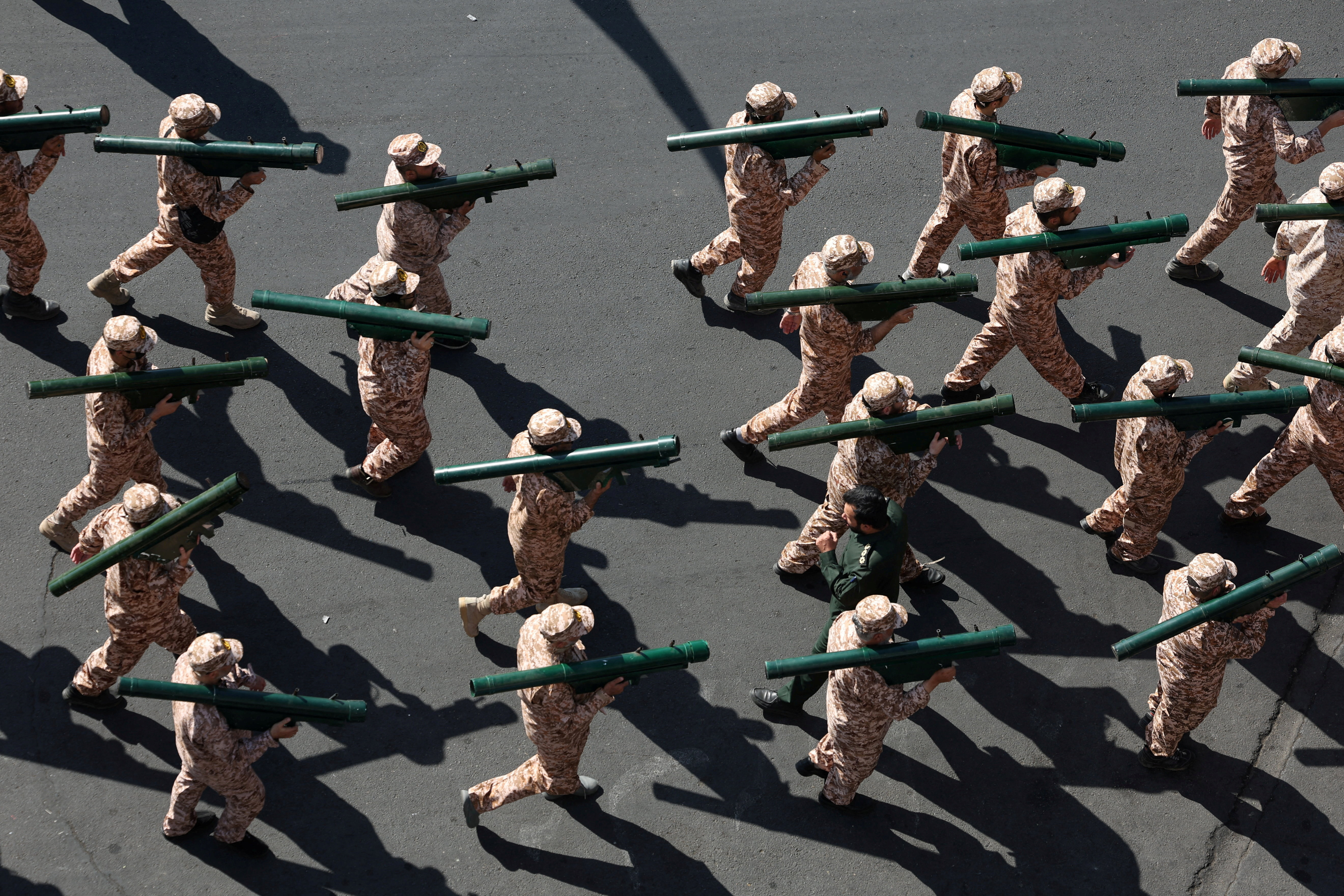 Members of Iranian militia forces (Basij) attend a military march in Tehran, Iran, September 18, 2026. [Majid Asgaripour/WANA via Reuters]