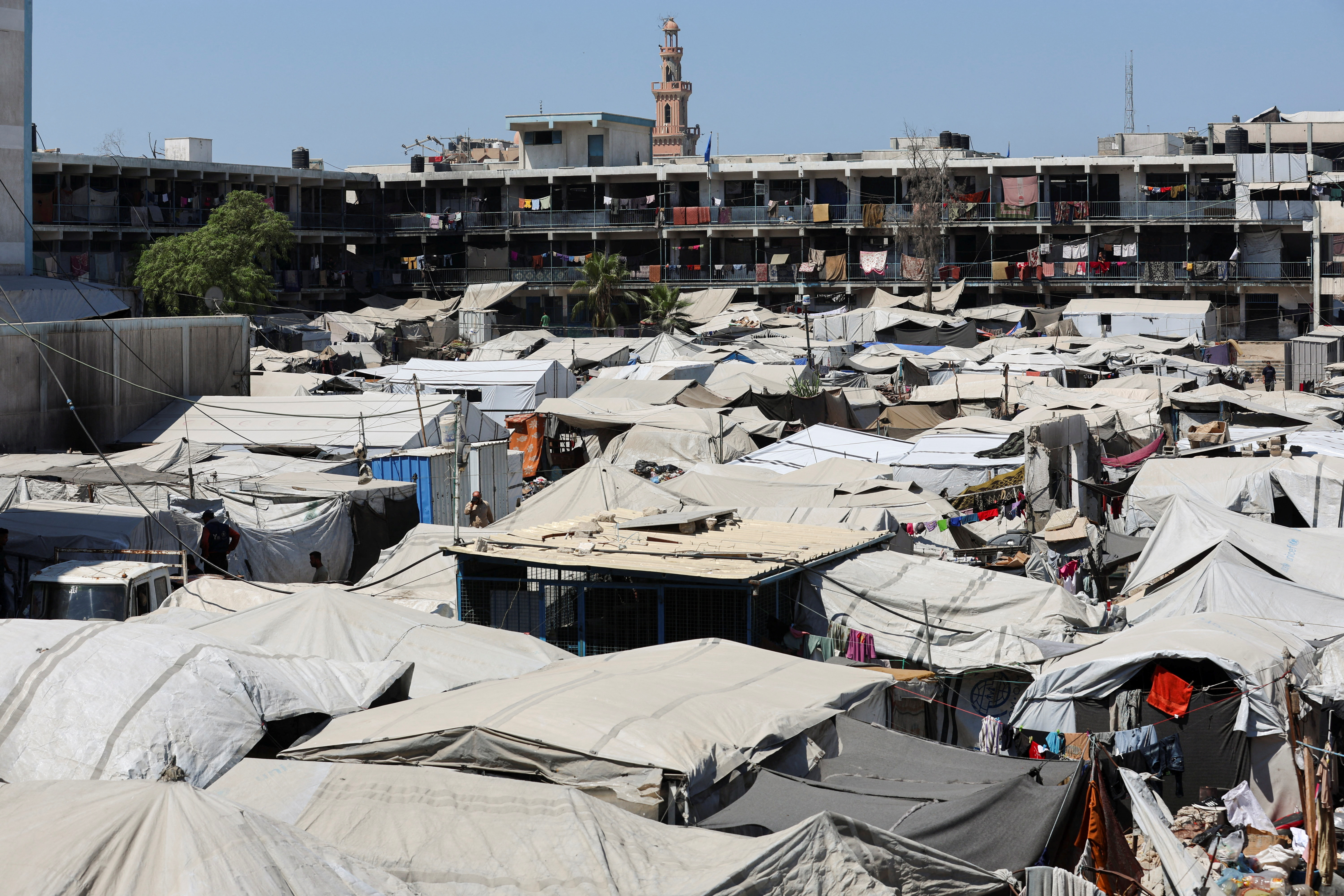 A tent camp sheltering displaced Palestinians in Al-Mawasi, Khan Younis in the southern Gaza Strip, on October 7, 2026 [Ramadan Abed/Reuters]