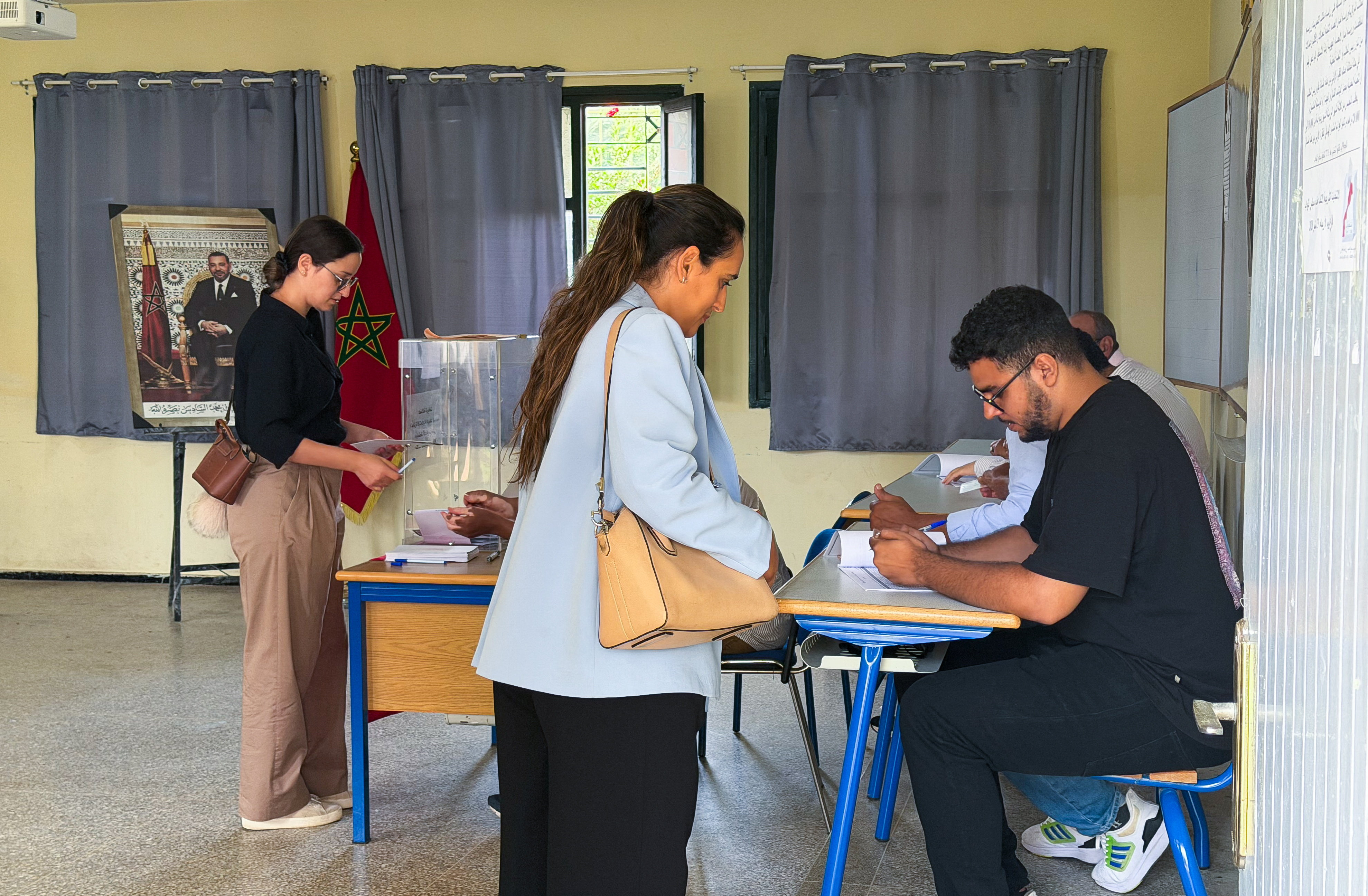 Two women cast their votes.