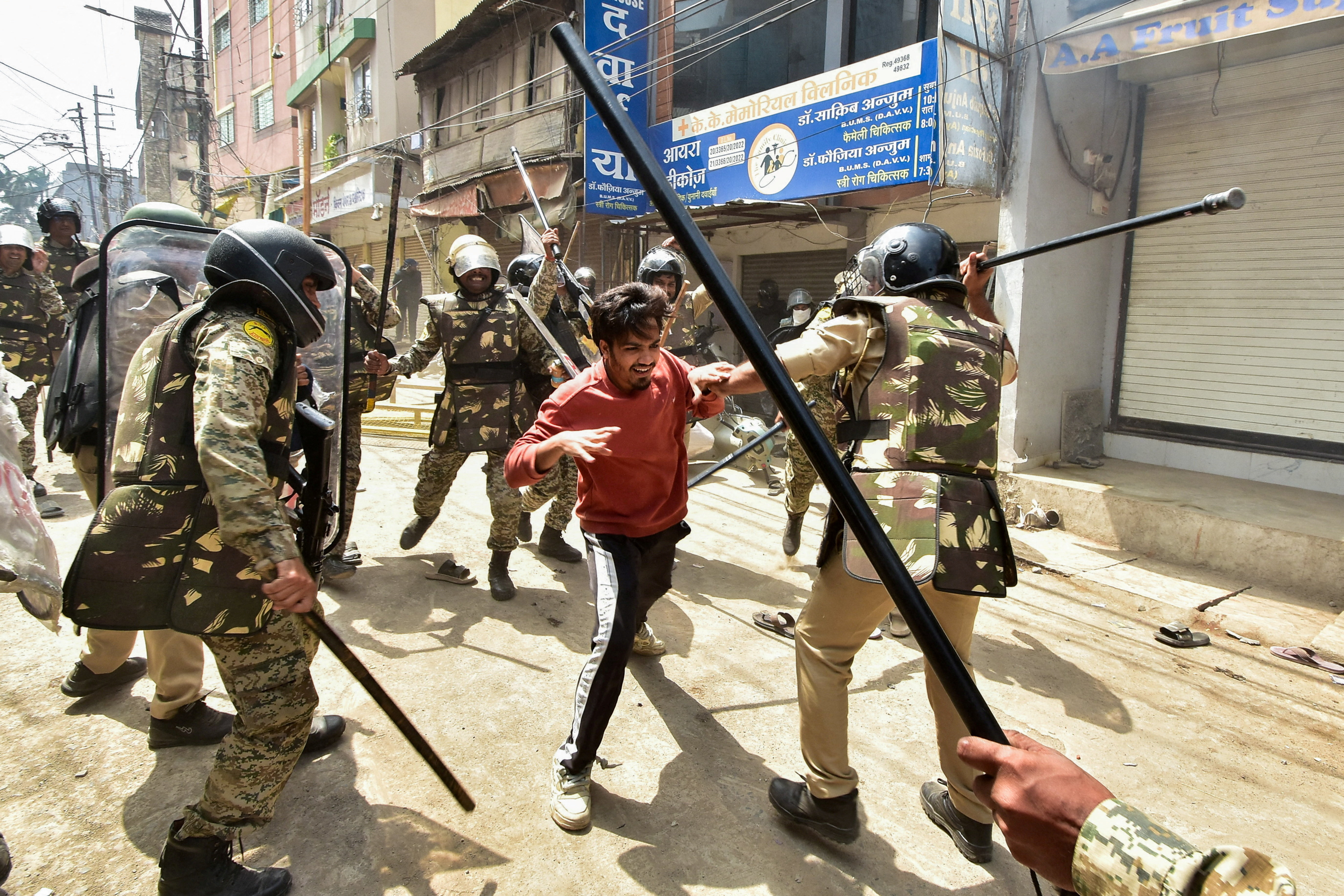 Police officers attack a demonstrator near Ujjain’s Shahi Masjid, September 28, 2026 [Reuters]