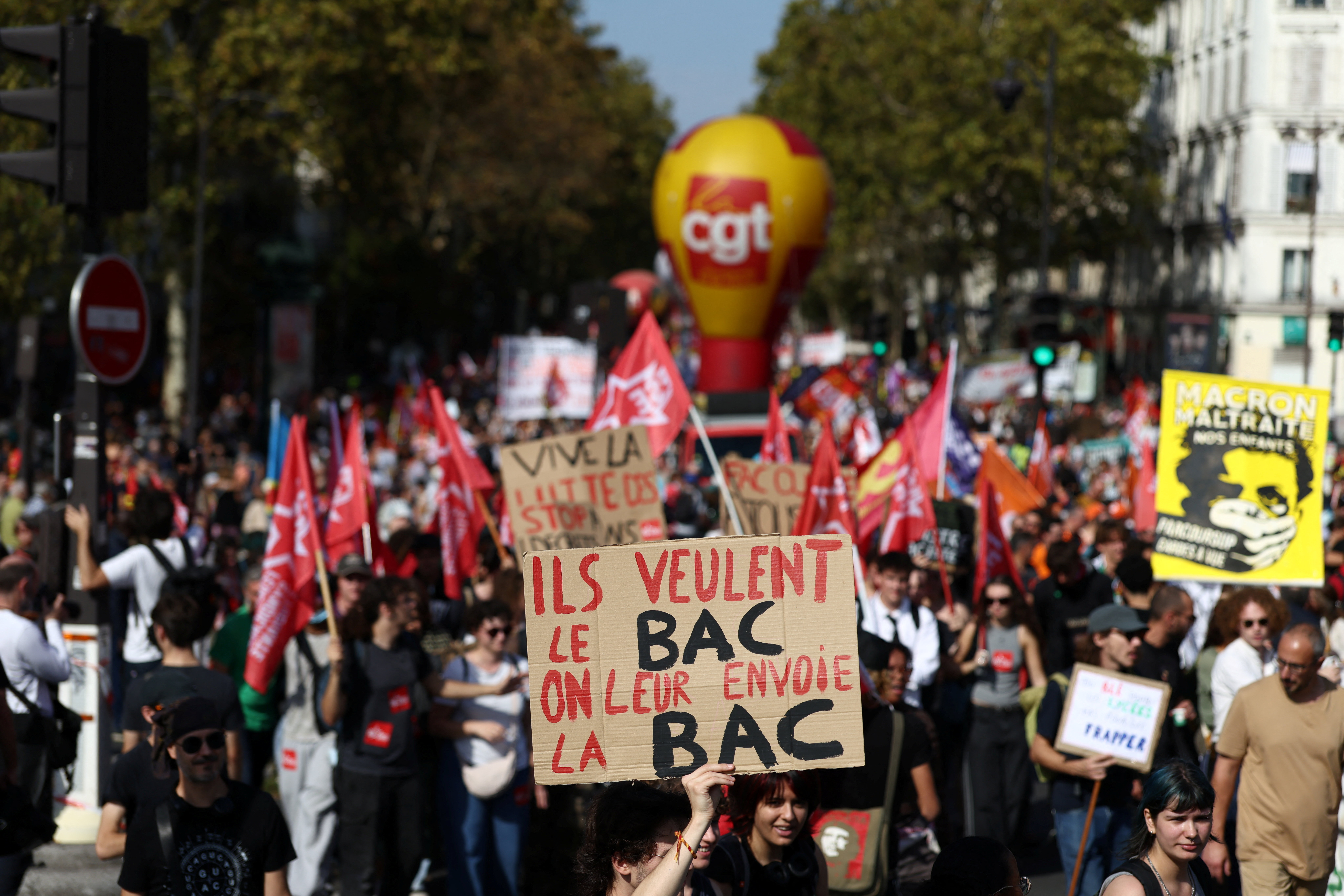 French students,public workers protest Macron’s planned budget cuts