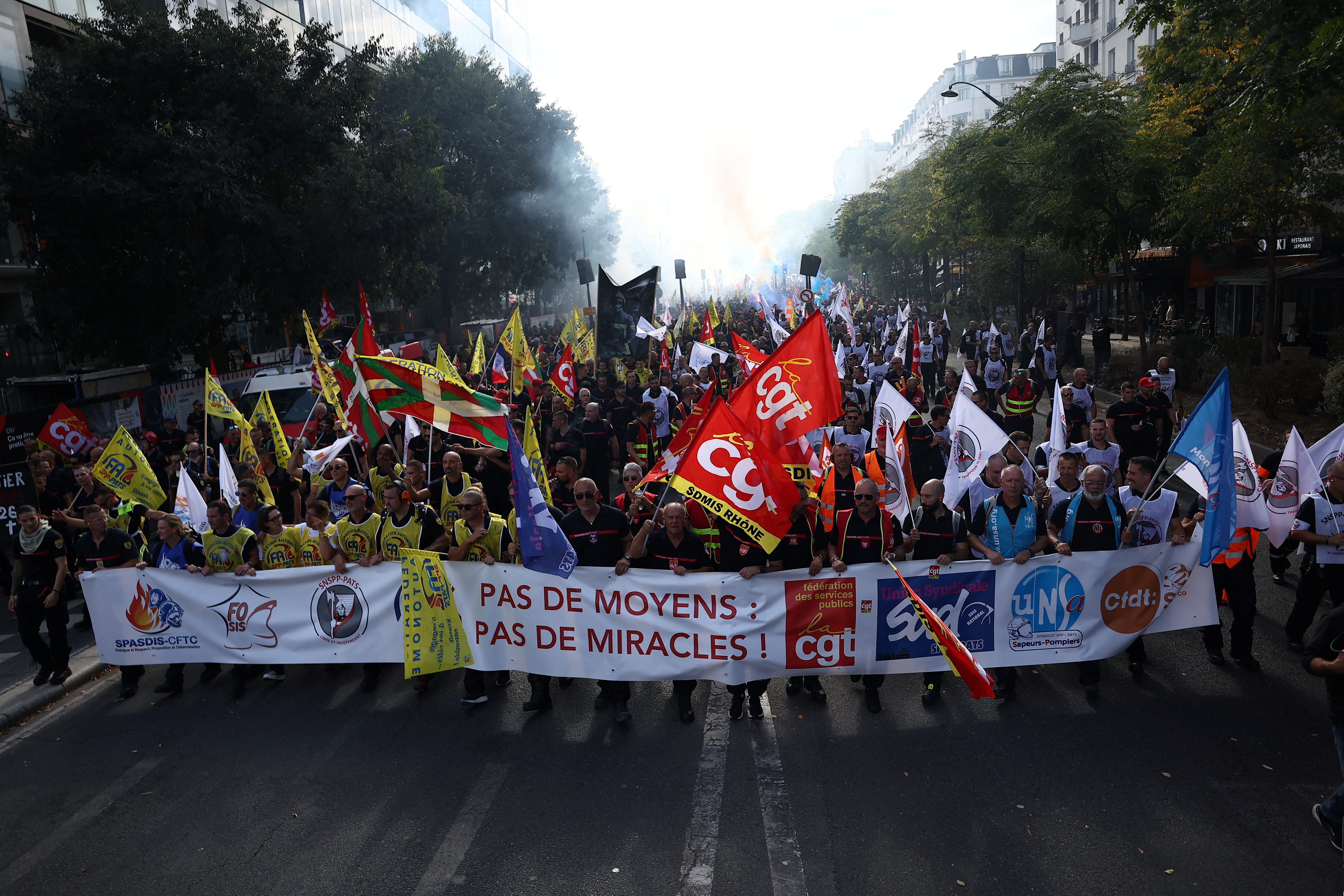 French students,public workers protest Macron’s planned budget cuts
