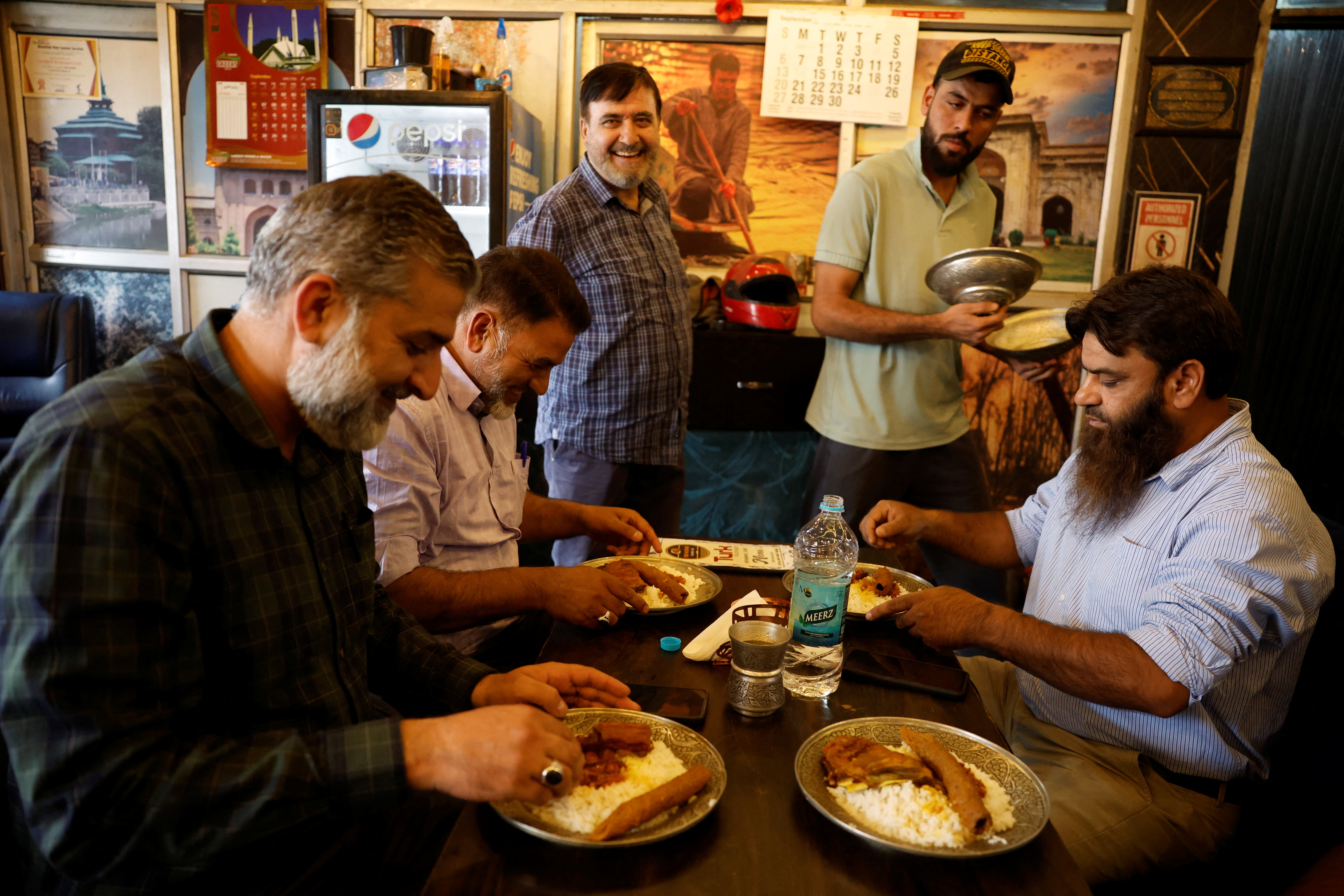 Kashmir’s 600-year-old Wazwan wedding feast adapts to modern life