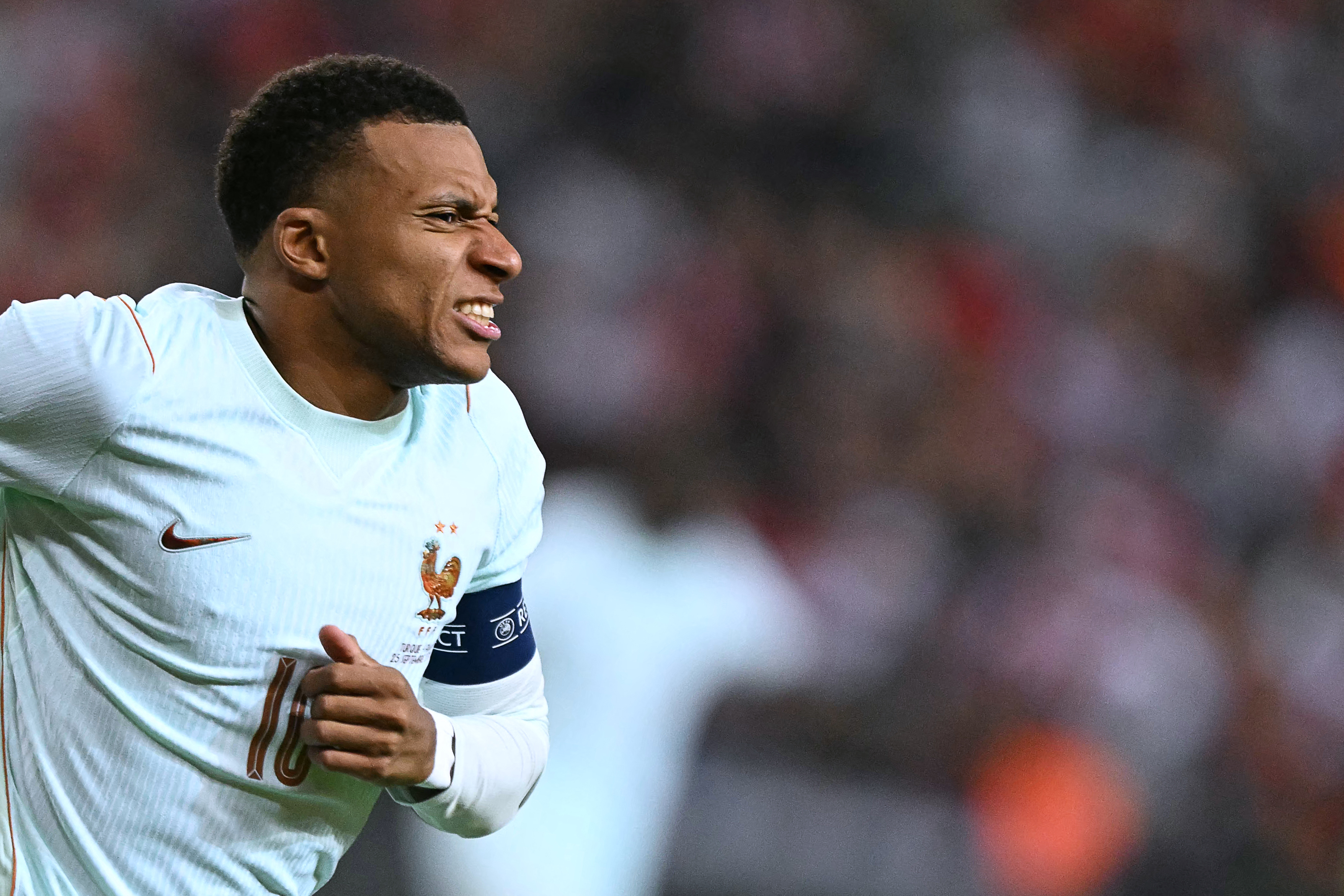France's forward #10 Kylian Mbappe reacts after scoring the opening goal and to a leg pain during the UEFA Nations League (League A, Group 1) first leg football match between Turkey and France at the Kocaeli Stadium in Izmit, on September 25, 2026. (Photo by OZAN KOSE / AFP)