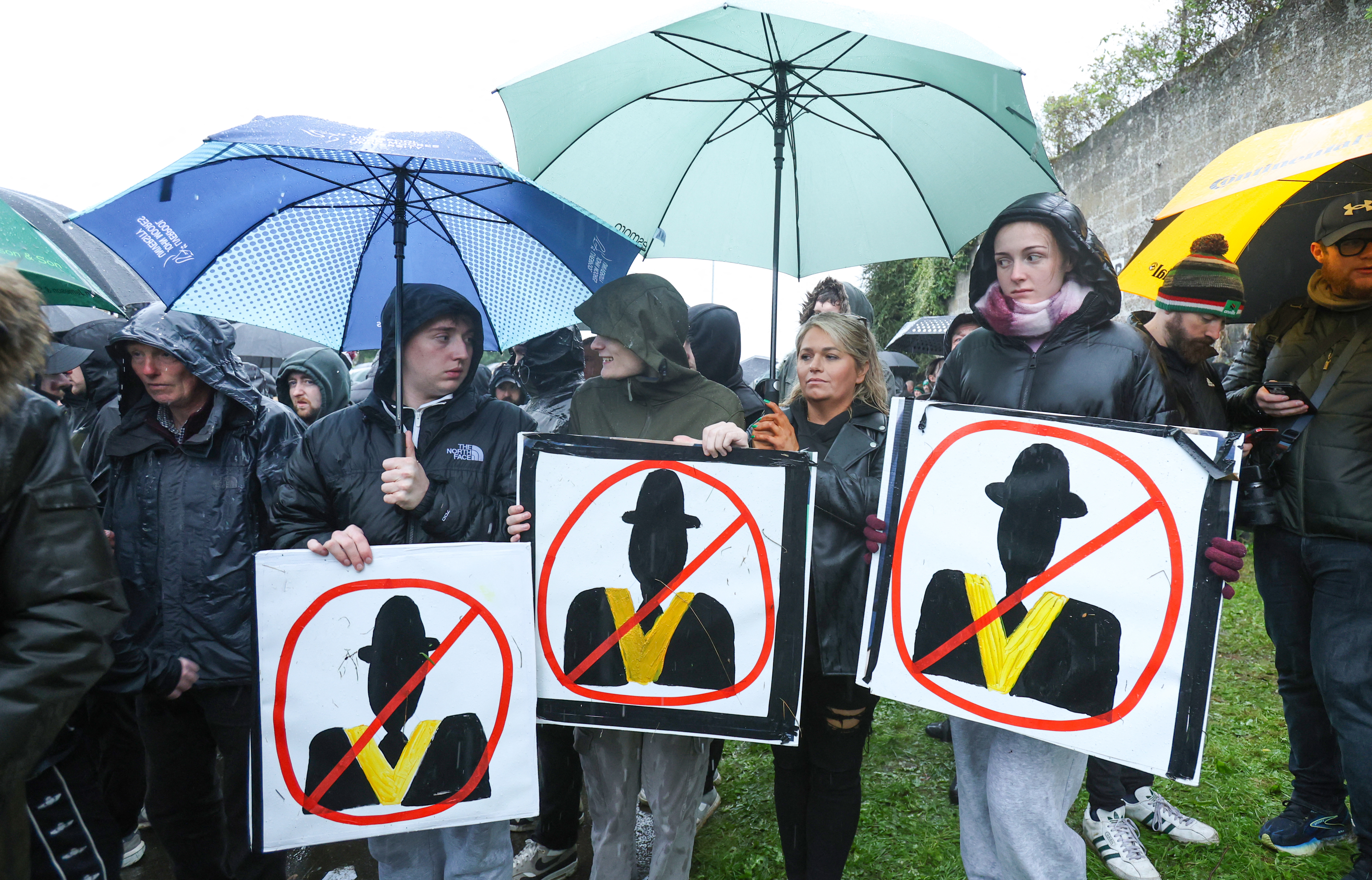 Northern Ireland protesters block Catholic area before Orange Order march
