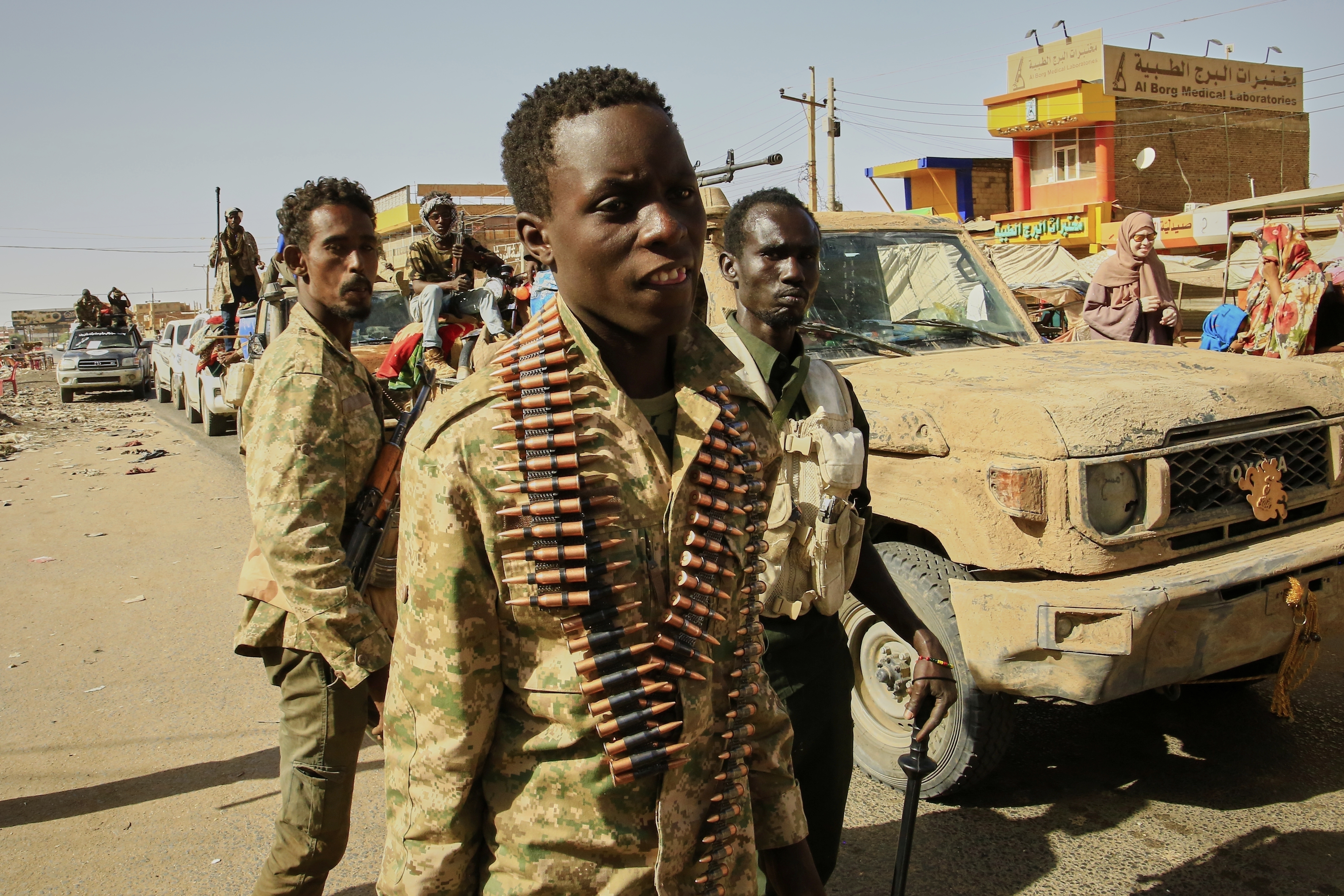FILE - Soldiers arrive to the Allafah market, in an area recently recaptured by Sudan's army from the Rapid Support Forces paramilitary group, in the Al Kalalah district, south of Khartoum, Sudan, March 27, 2025. (AP Photo, File)