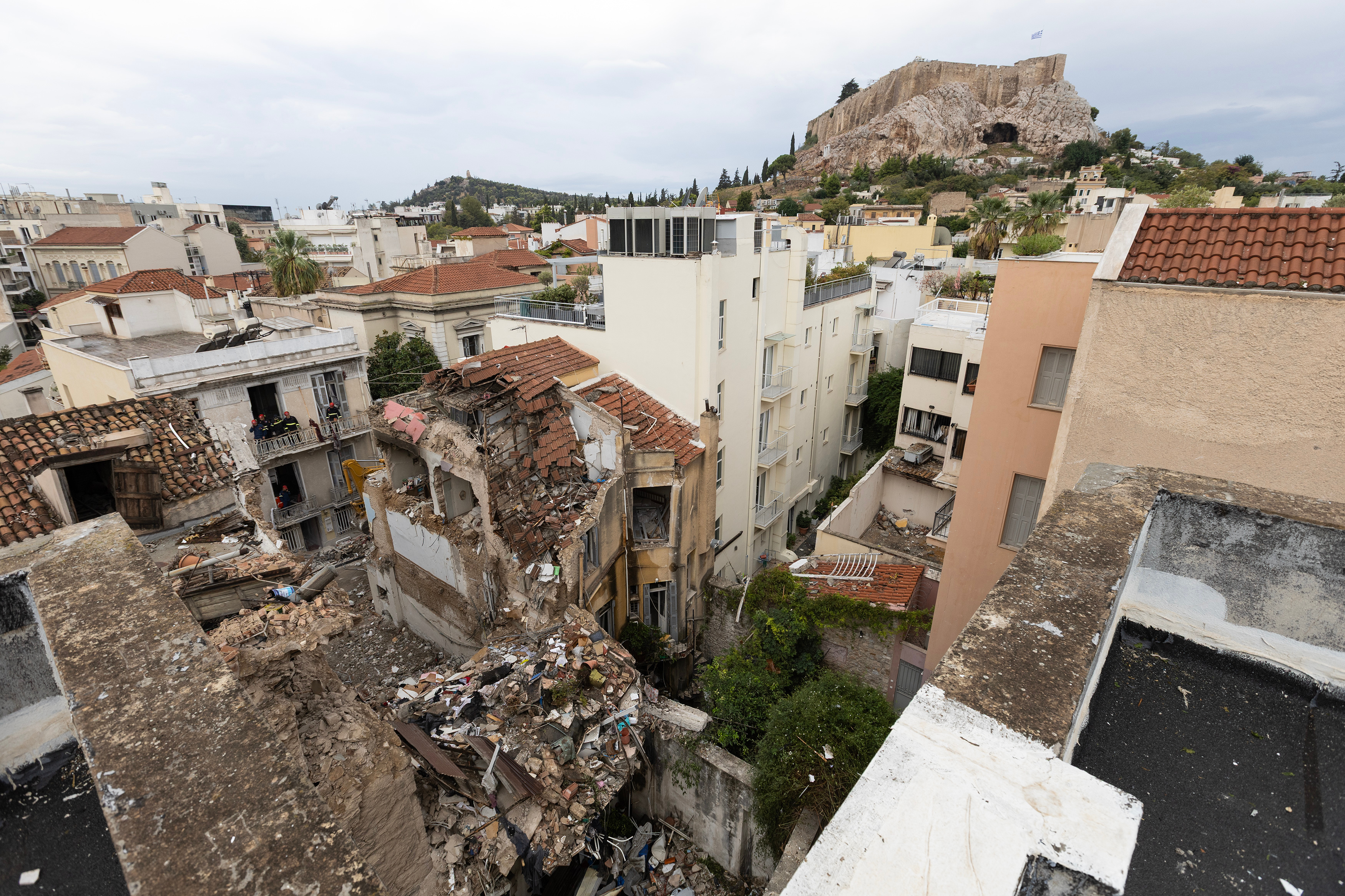 A general view of the area where a powerful blast caused a building to collapse and killed six people in Athens' Plaka district, Saturday, September 26, 2026 [Yorgos Karahalis/AP]