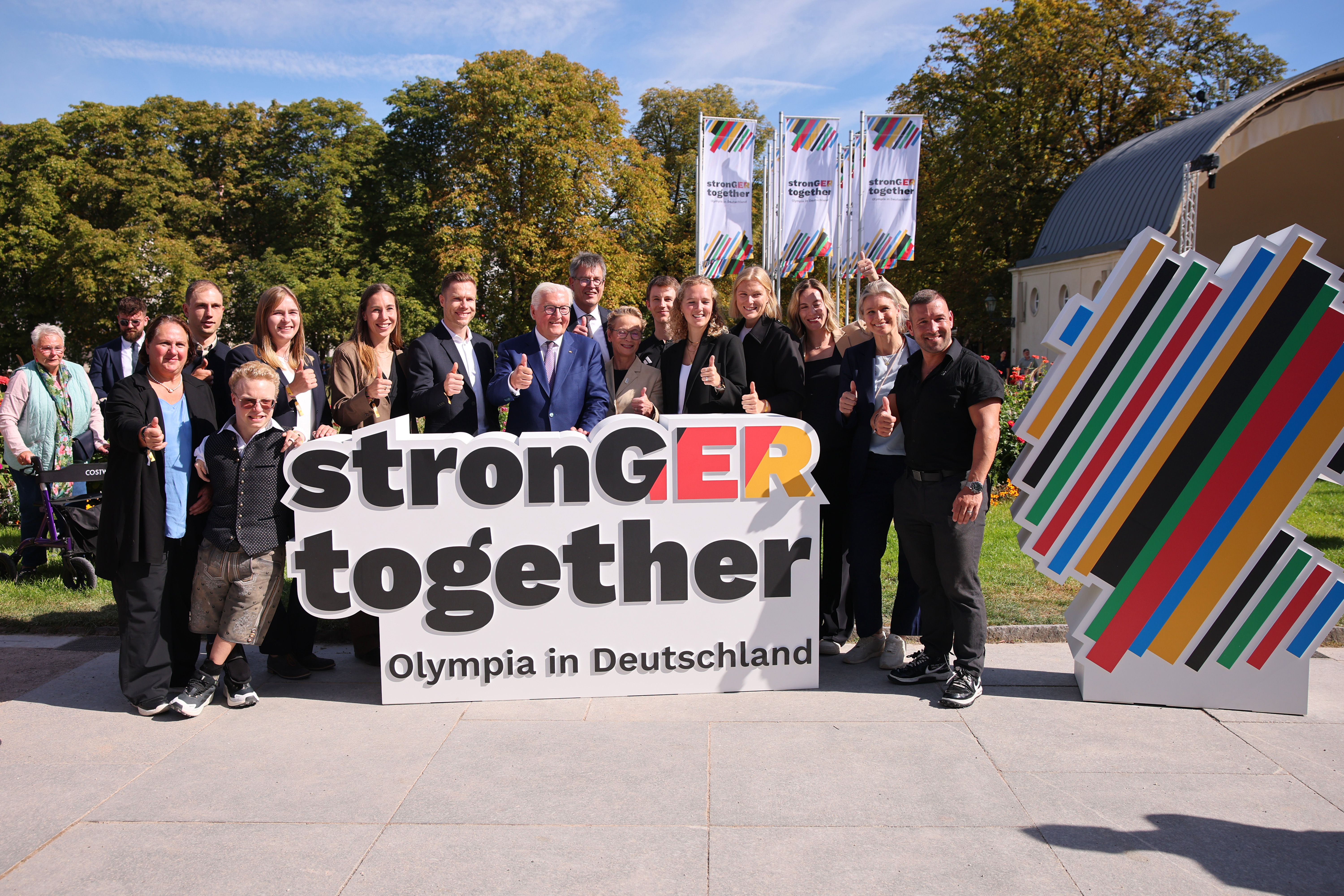 BADEN-BADEN, GERMANY - SEPTEMBER 26: German President Frank-Walter Steinmeier poses with athletes during the extraordinary German Olympic Sports Confederation (DOSB) general assembly at Kurhaus Baden-Baden on September 26, 2026 in Baden-Baden, Germany. At the DOSB's extraordinary general assembly, delegates will be able to vote on bids for either Munich or the KölnRheinRuhr region to compete to host the 2036, 2040 or 2044 Olympic and Paralympic Games. (Photo by Alex Grimm/Getty Images)
