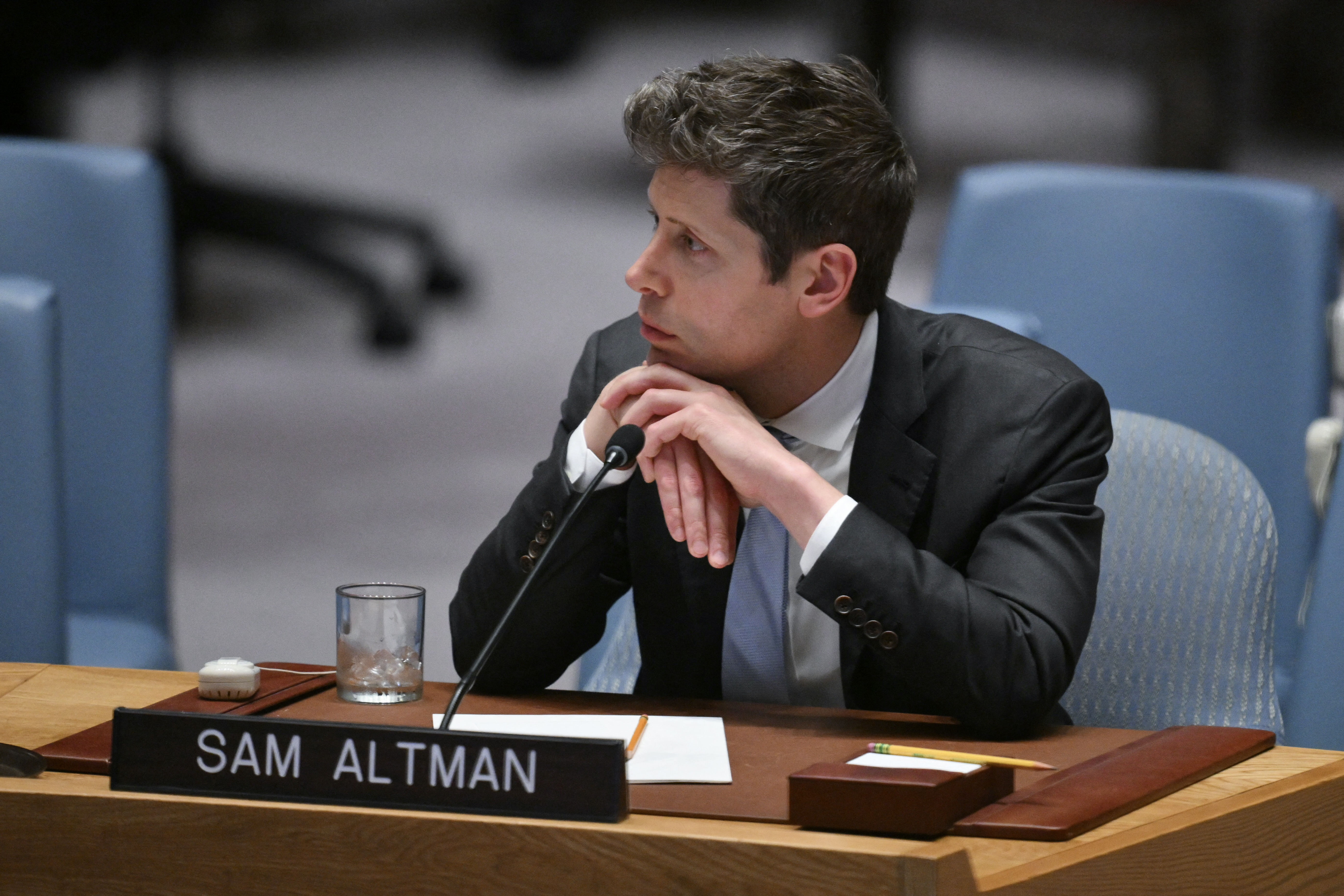 OpenAI CEO Sam Altman looks on during a UN Security Council meeting on artificial intelligence during the 81st United Nations General Assembly at UN headquarters in New York on September 23, 2026. (Photo by ANGELA WEISS / AFP)