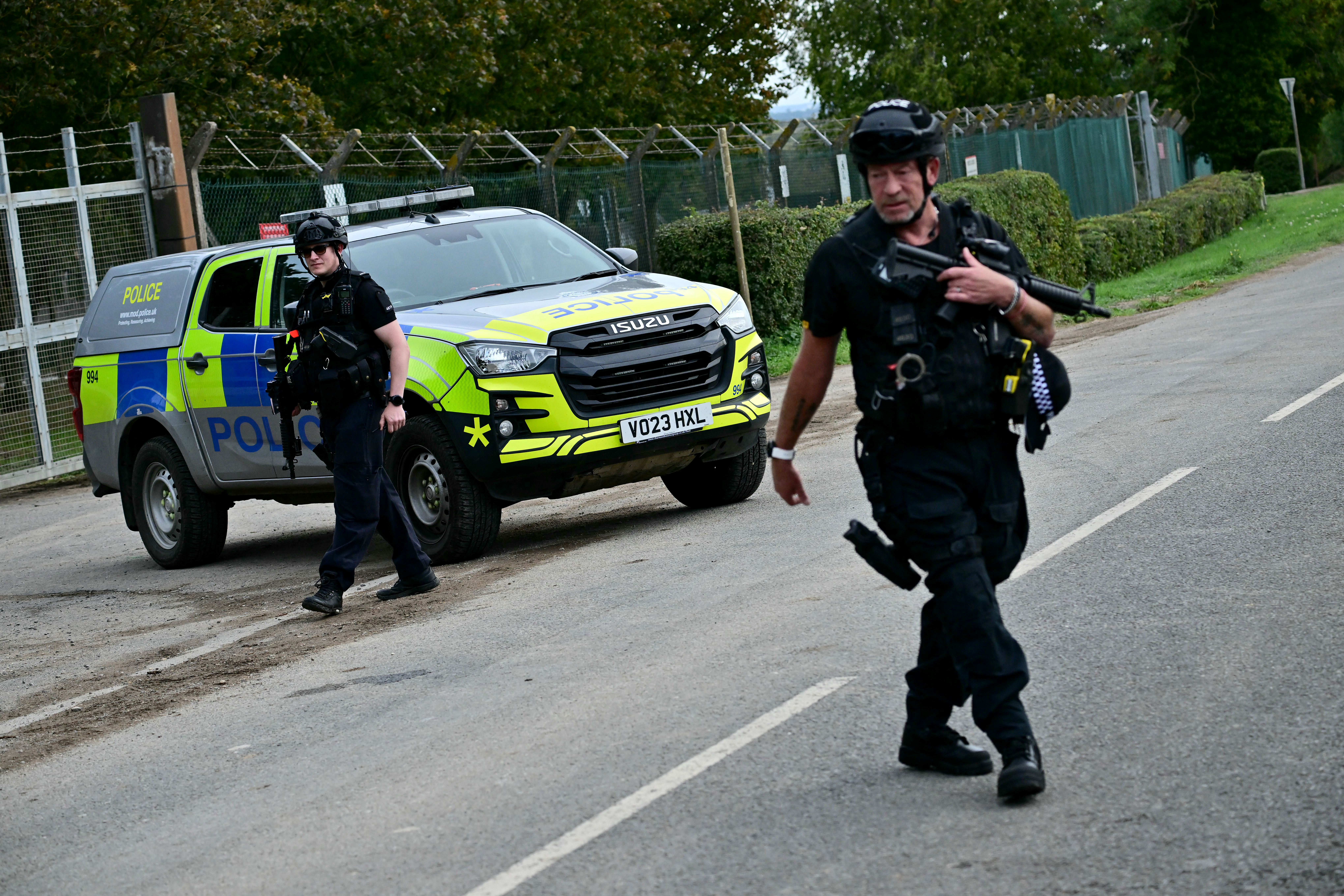 Armed Police stand outside RAF Fairford base in Fairford, south-west England on September 28, 2026, a day after British counter-terrorism police were probing "a major" incident near the base used by the US Air Force.