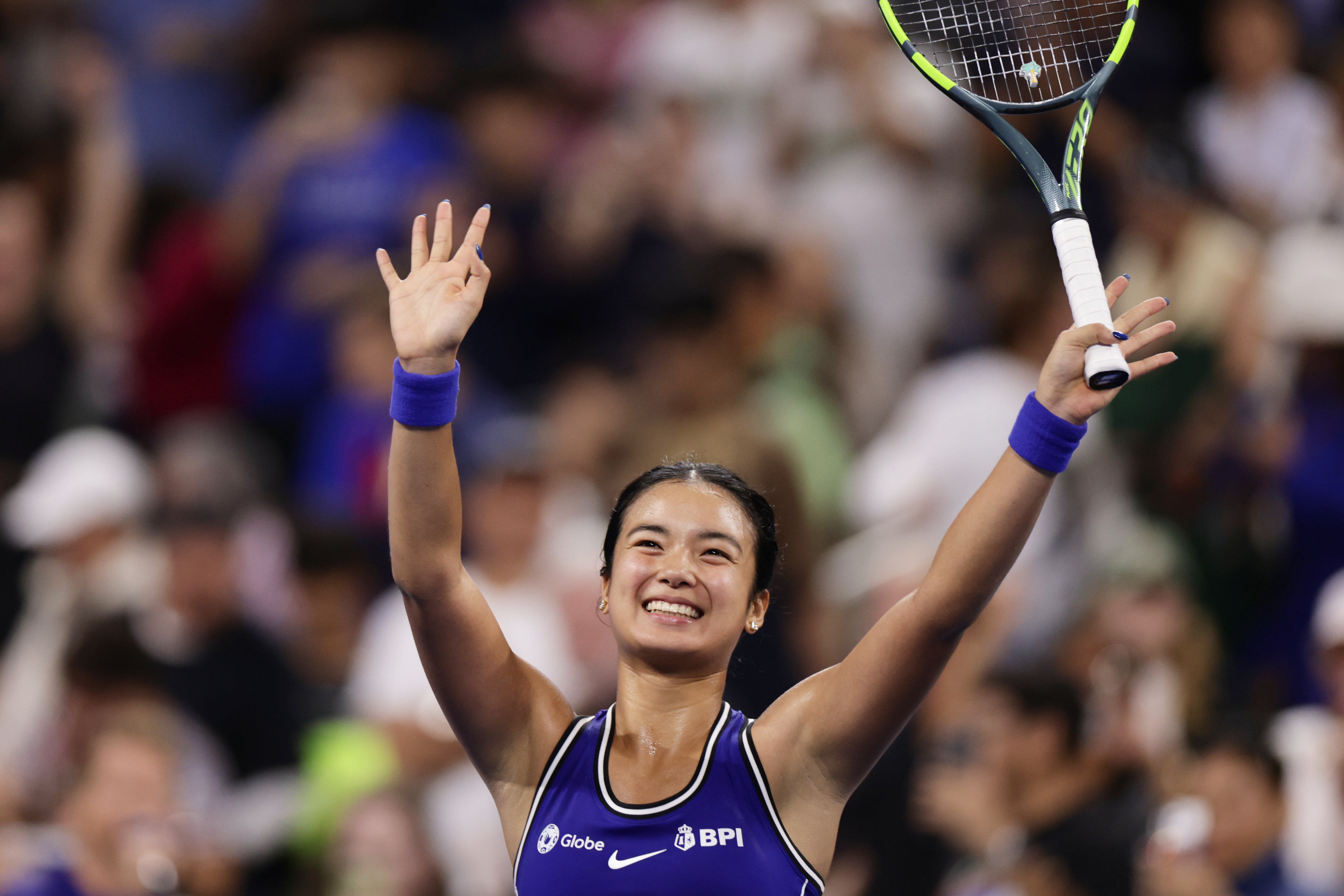 Eala acknowledges the crowd after defeating Mary Stoiana in the first round of the US Open in New York