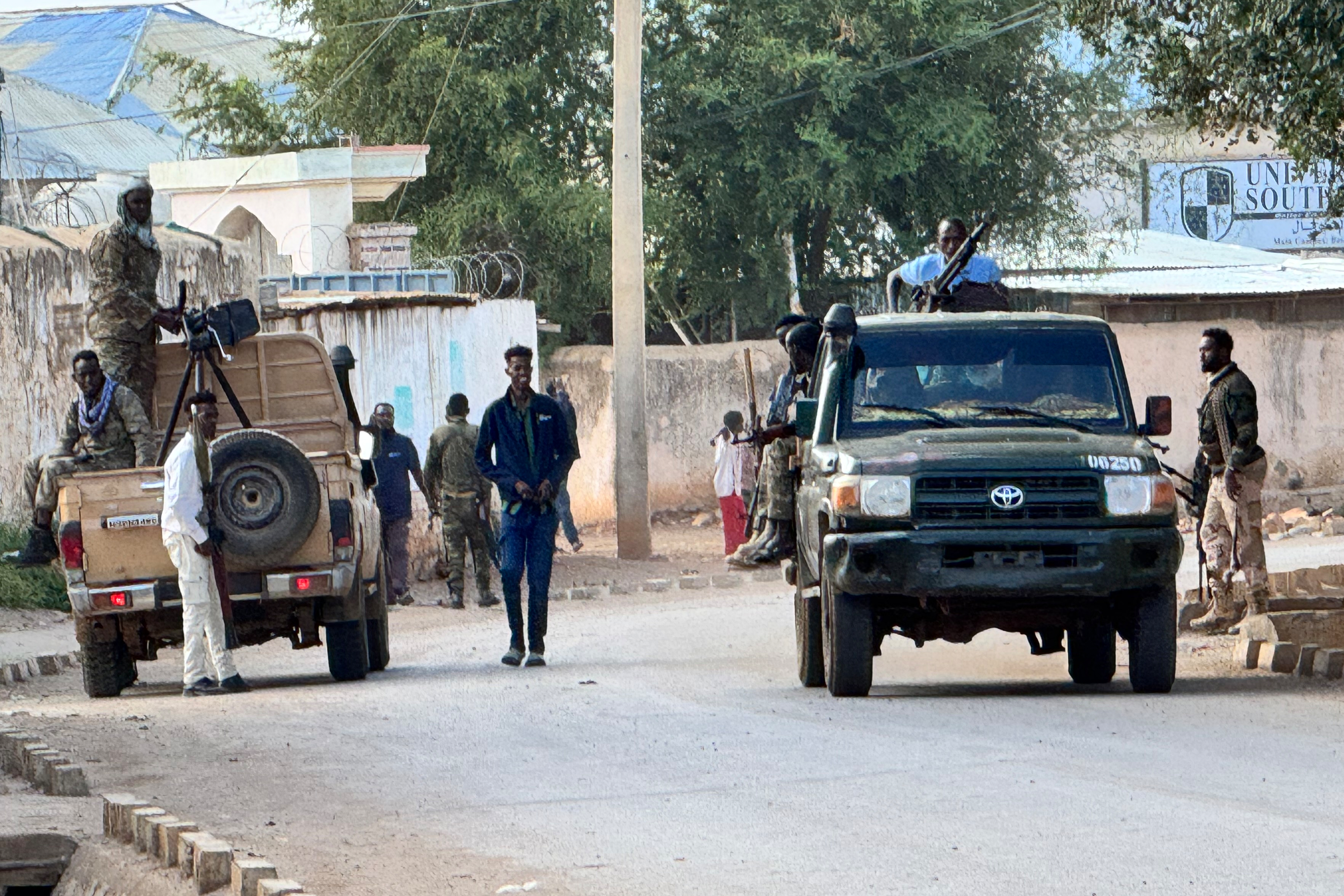 In this photo taken with a smartphone, security personnel patrol a street in Baidoa, Somalia, Thursday, Sept. 3, 2026. (AP Photo/Bishar Mayow Mukhtar)